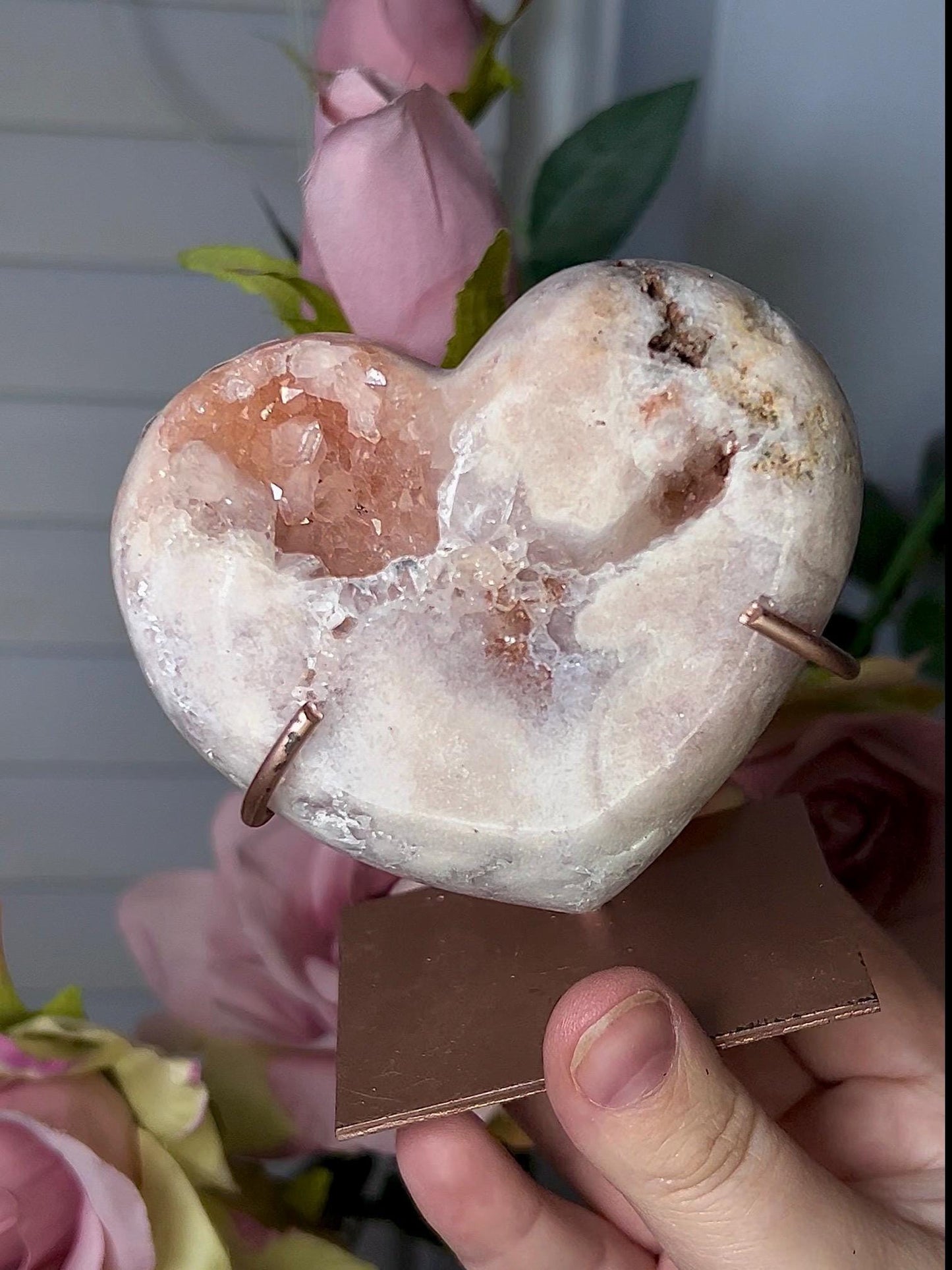 Beautiful, pink amethyst heart in peach tones with stand