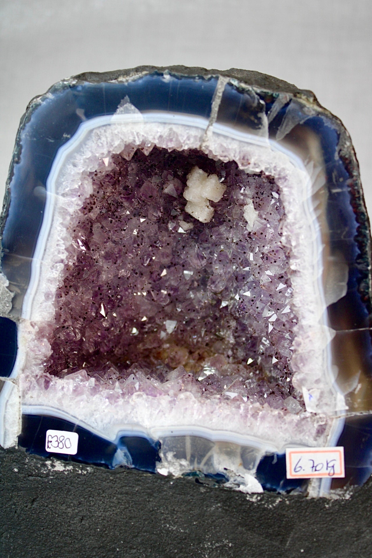 Large amethyst cathedral with agate banding and sugar druzy, cubic calcite - 6.7kg - slight damage in corner but can be painted