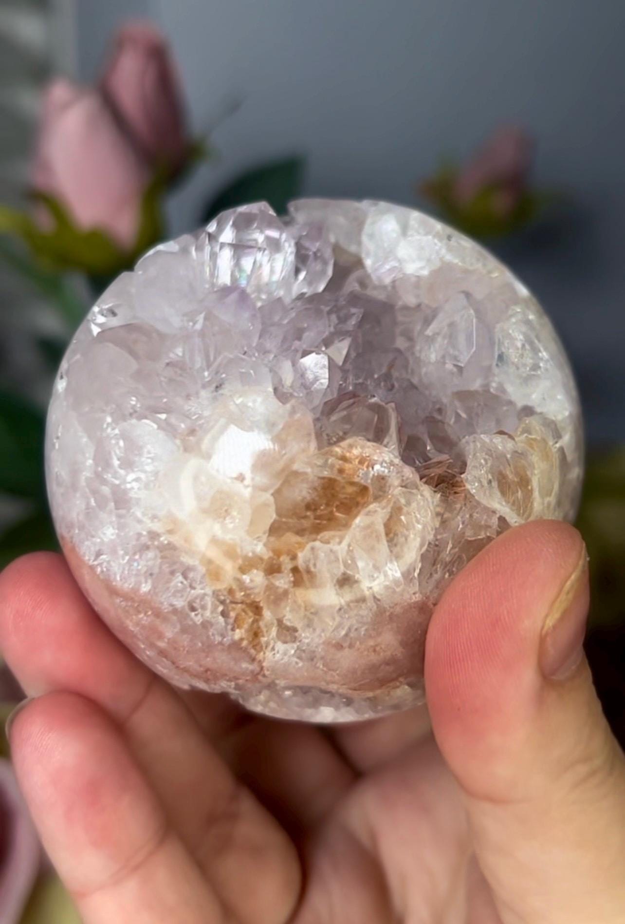 High grade, pink amethyst sphere with high clarity, rainbow, quartz teeth 429g