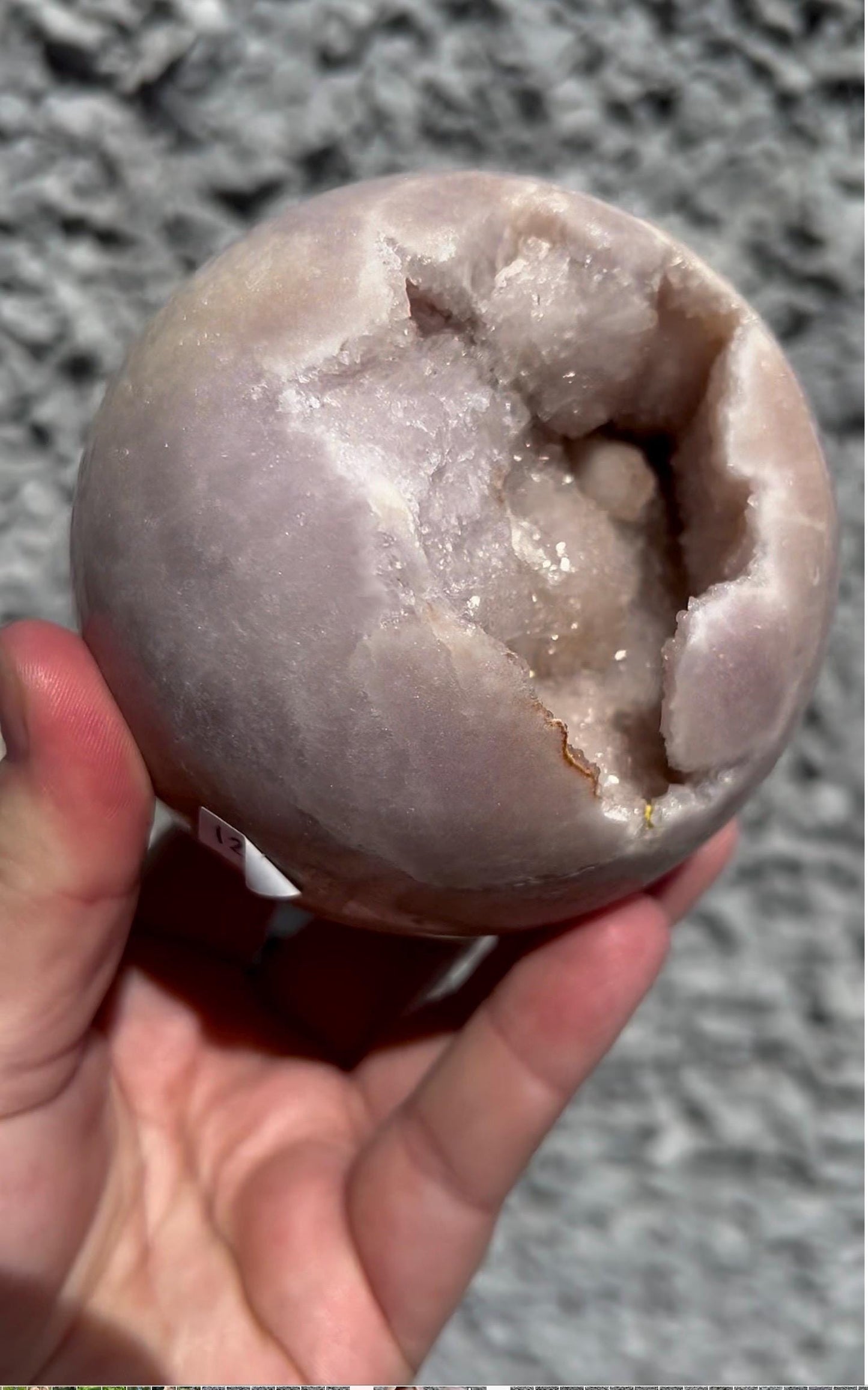 large, perfect baby pink amethyst sphere with sugar druzy cave and jasper 895g