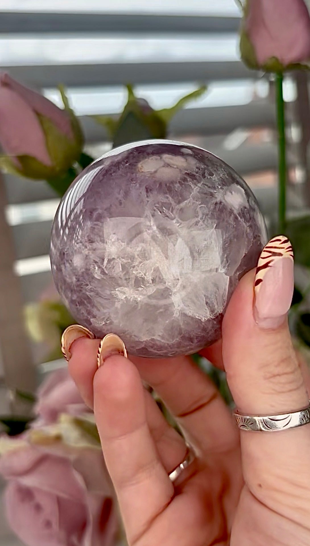 High grade, amethyst Flower agate sphere with high clarity quartz
