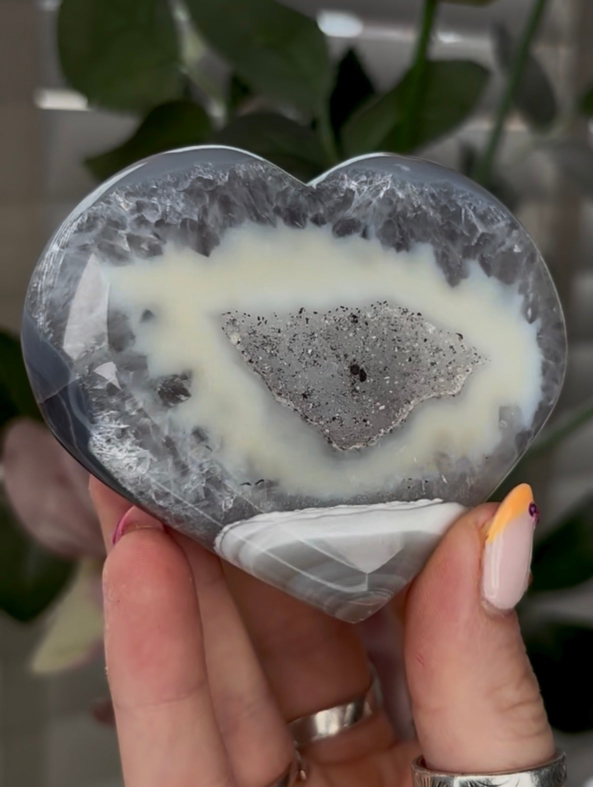 Beautiful, high grade, banded agate heart with druzy - comes with stand