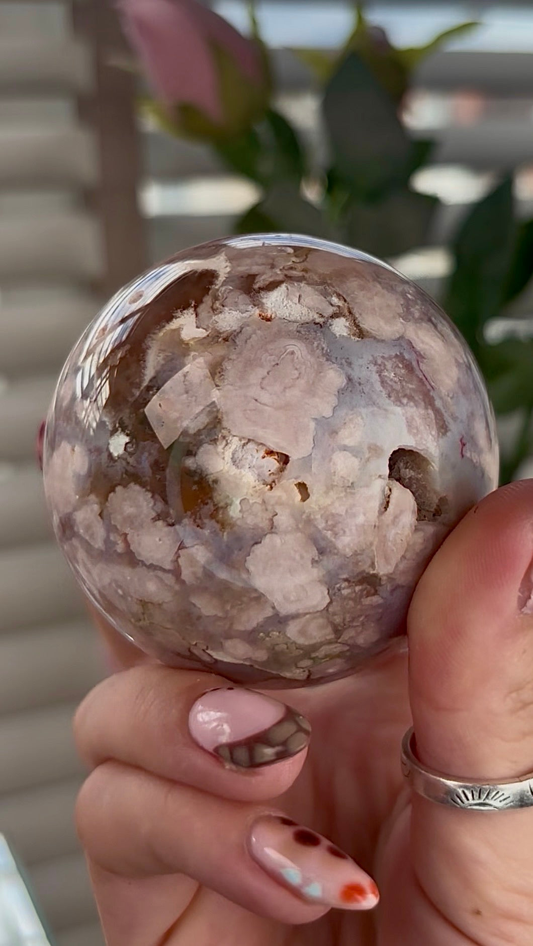 High grade, amethyst Flower agate sphere with high clarity quartz