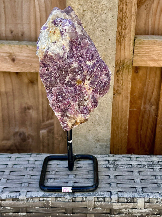 Rough lepidolite on stand