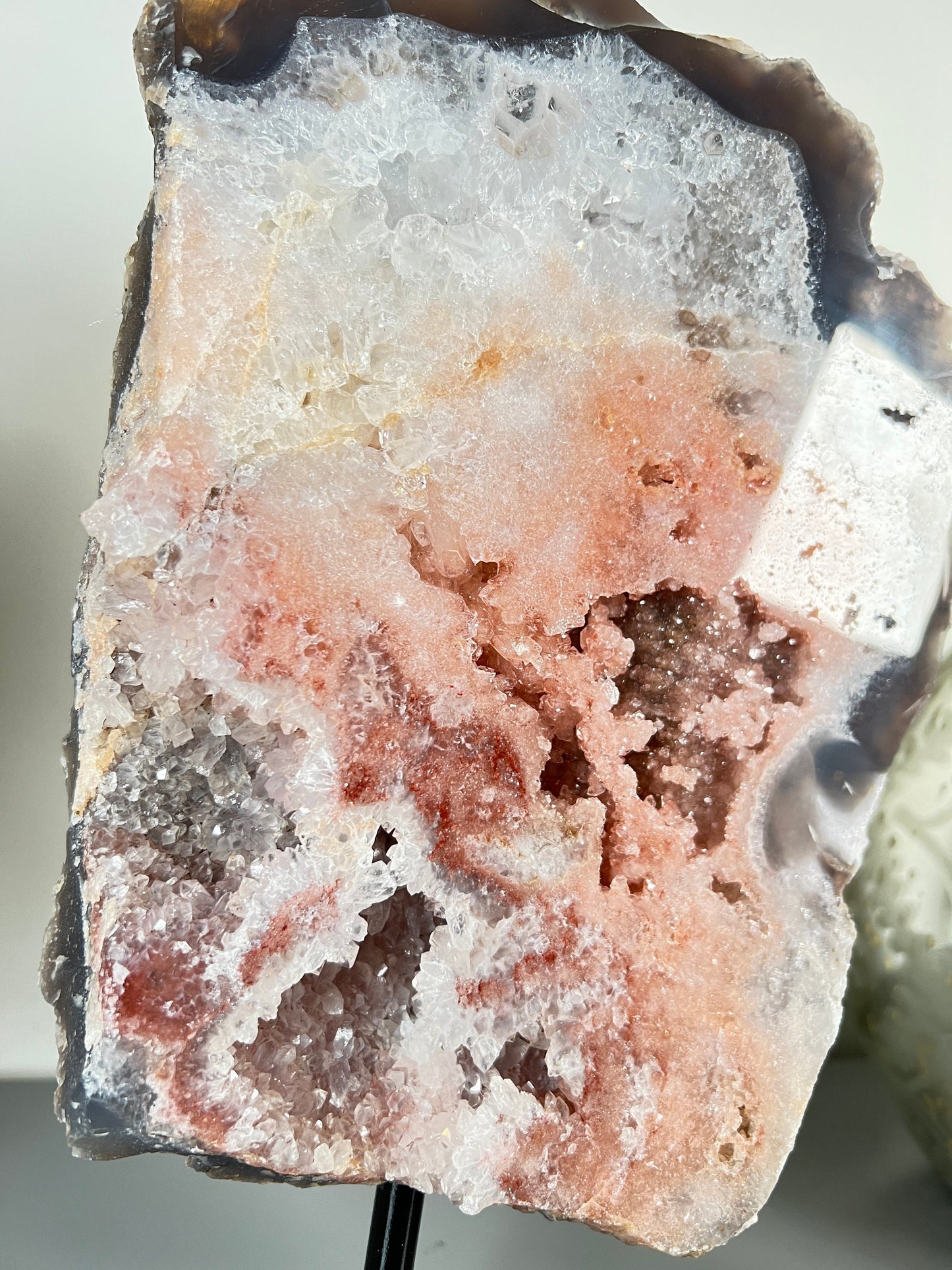 Peach, pink amethyst slab on stand  with smoky, clear and red crystallisation
