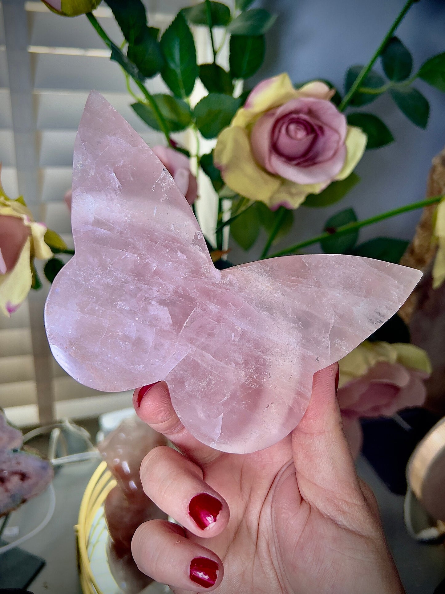 High grade, rose quartz butterfly with gold pedestal stand