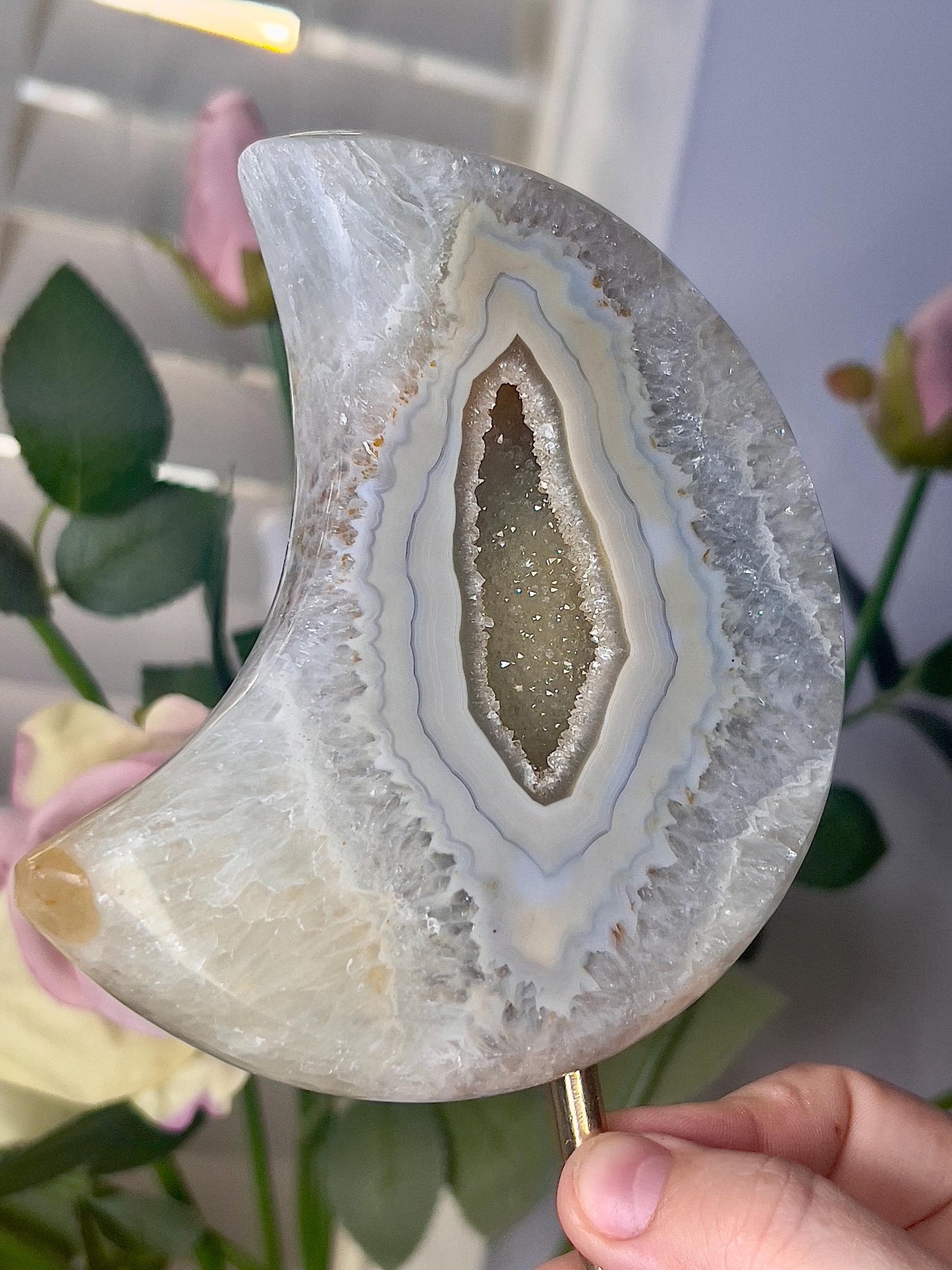 Beautiful, agate moon, with lime green toned, open druzy middle, on stand 640g 19cmt(h)