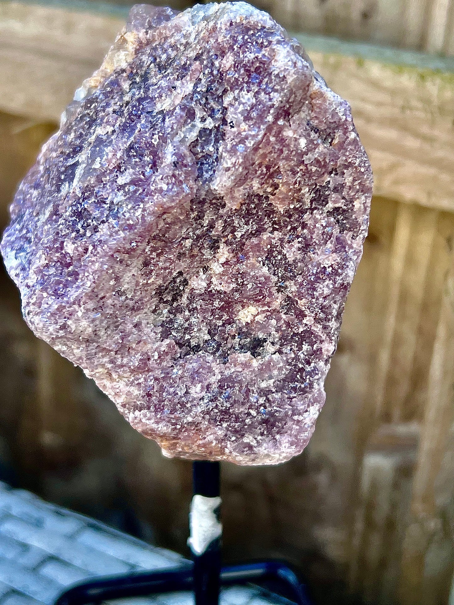 Rough lepidolite on stand