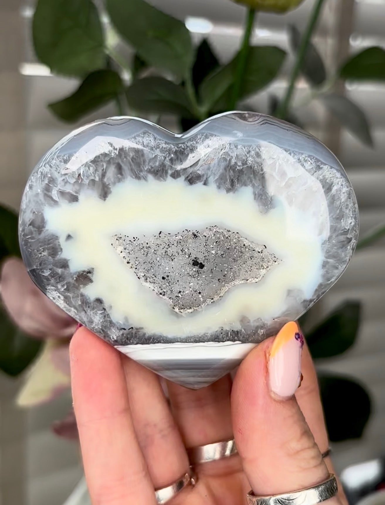 Beautiful, high grade, banded agate heart with druzy - comes with stand