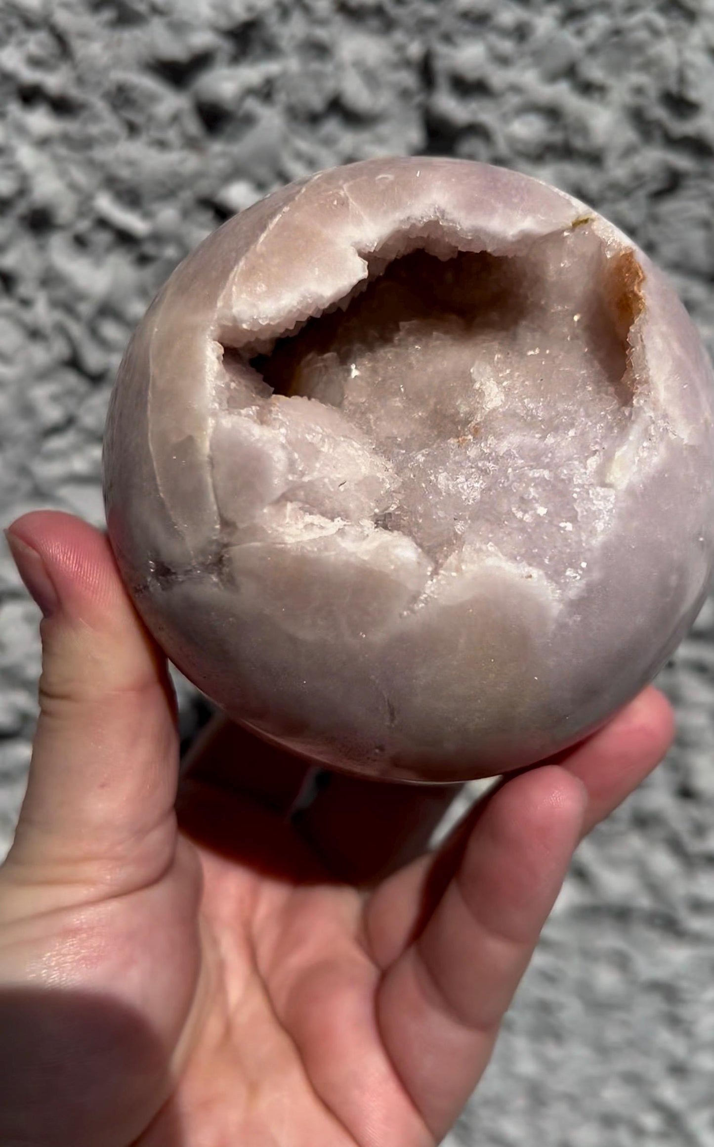 large, perfect baby pink amethyst sphere with sugar druzy cave and jasper 895g