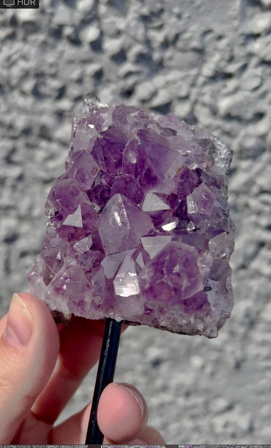 amethyst cluster on stand