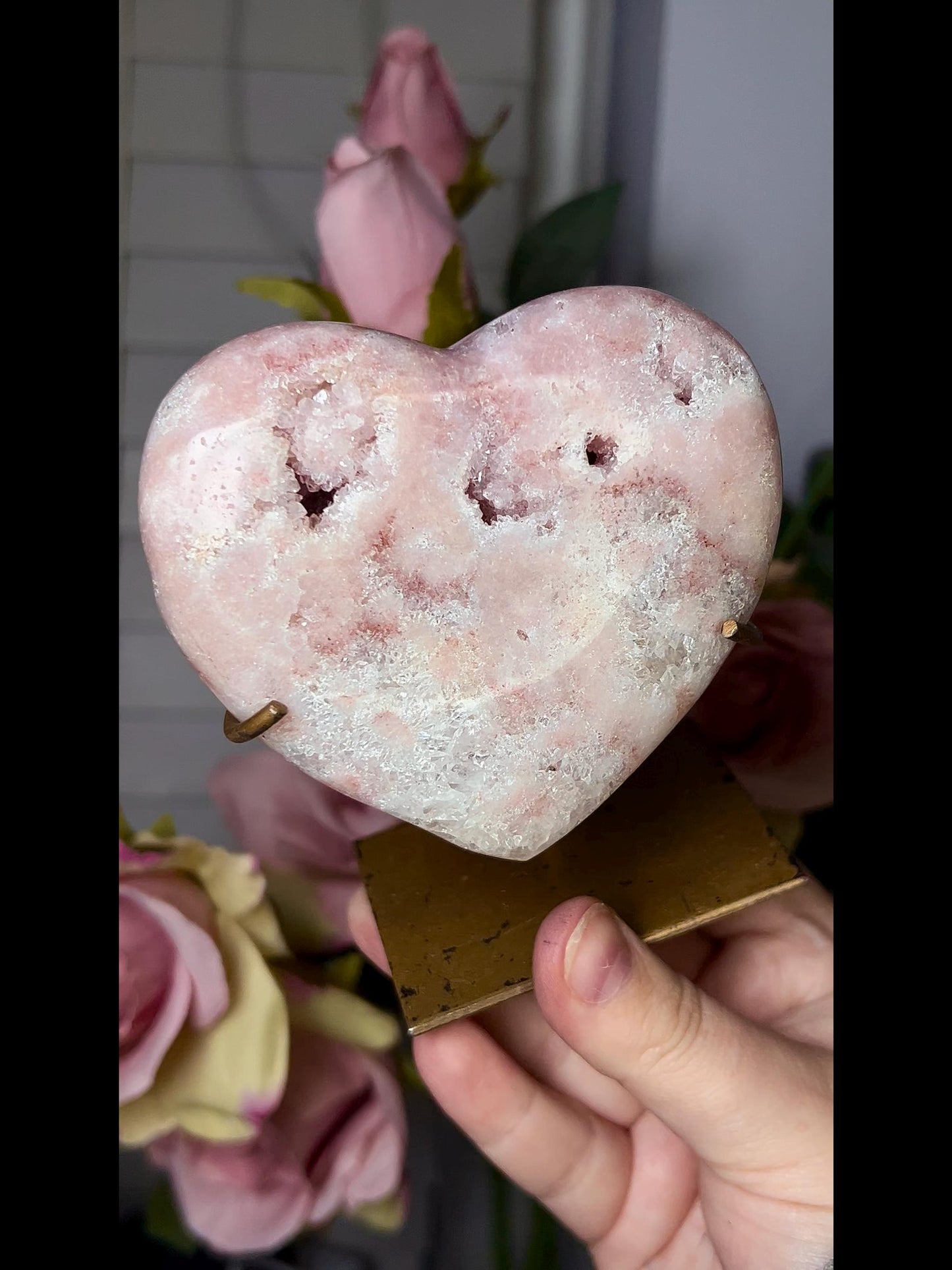 Beautiful, pink amethyst heart in peach tones with stand that is scratched (discount added)
