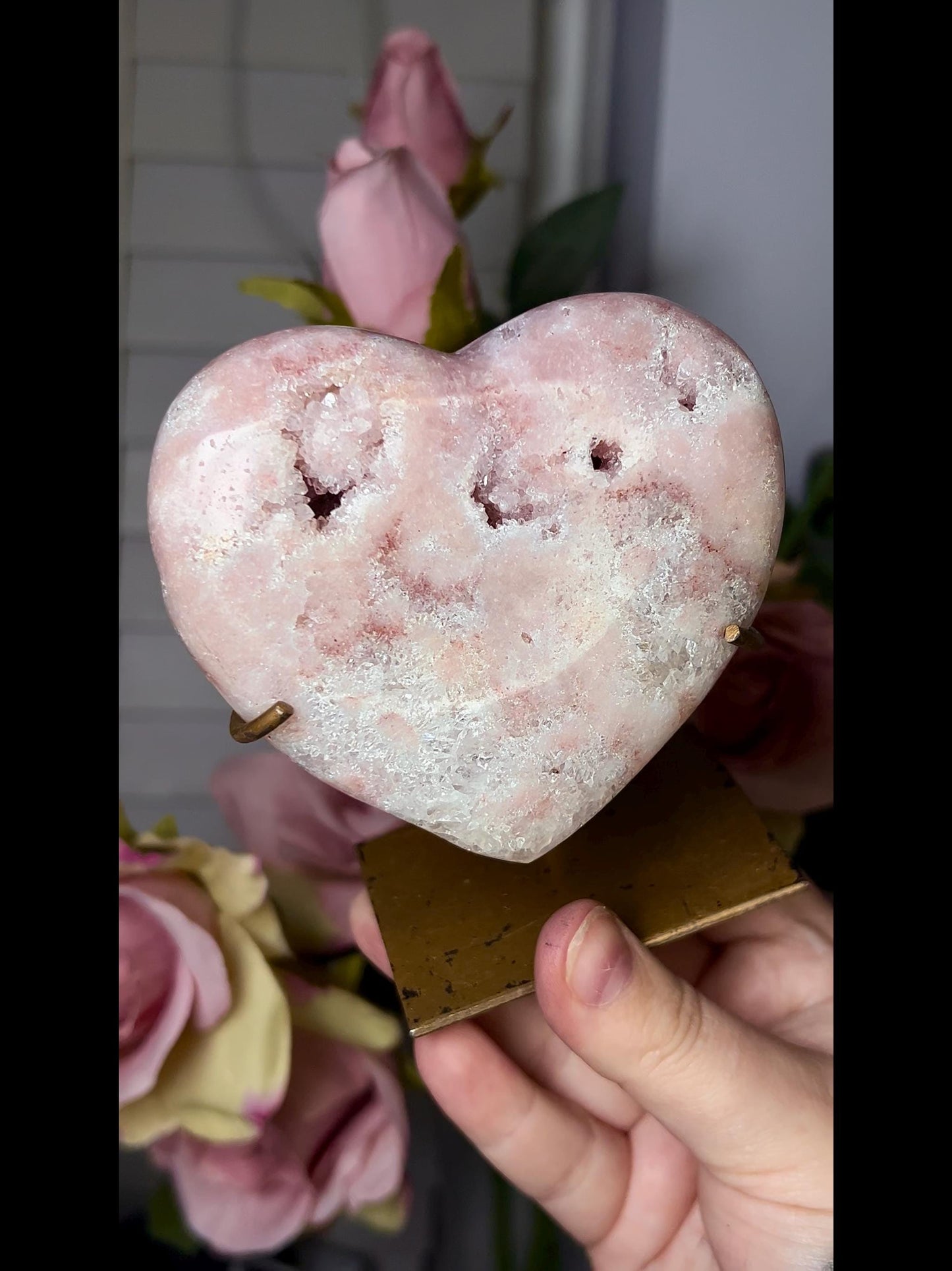 Beautiful, pink amethyst heart in peach tones with stand that is scratched (discount added)