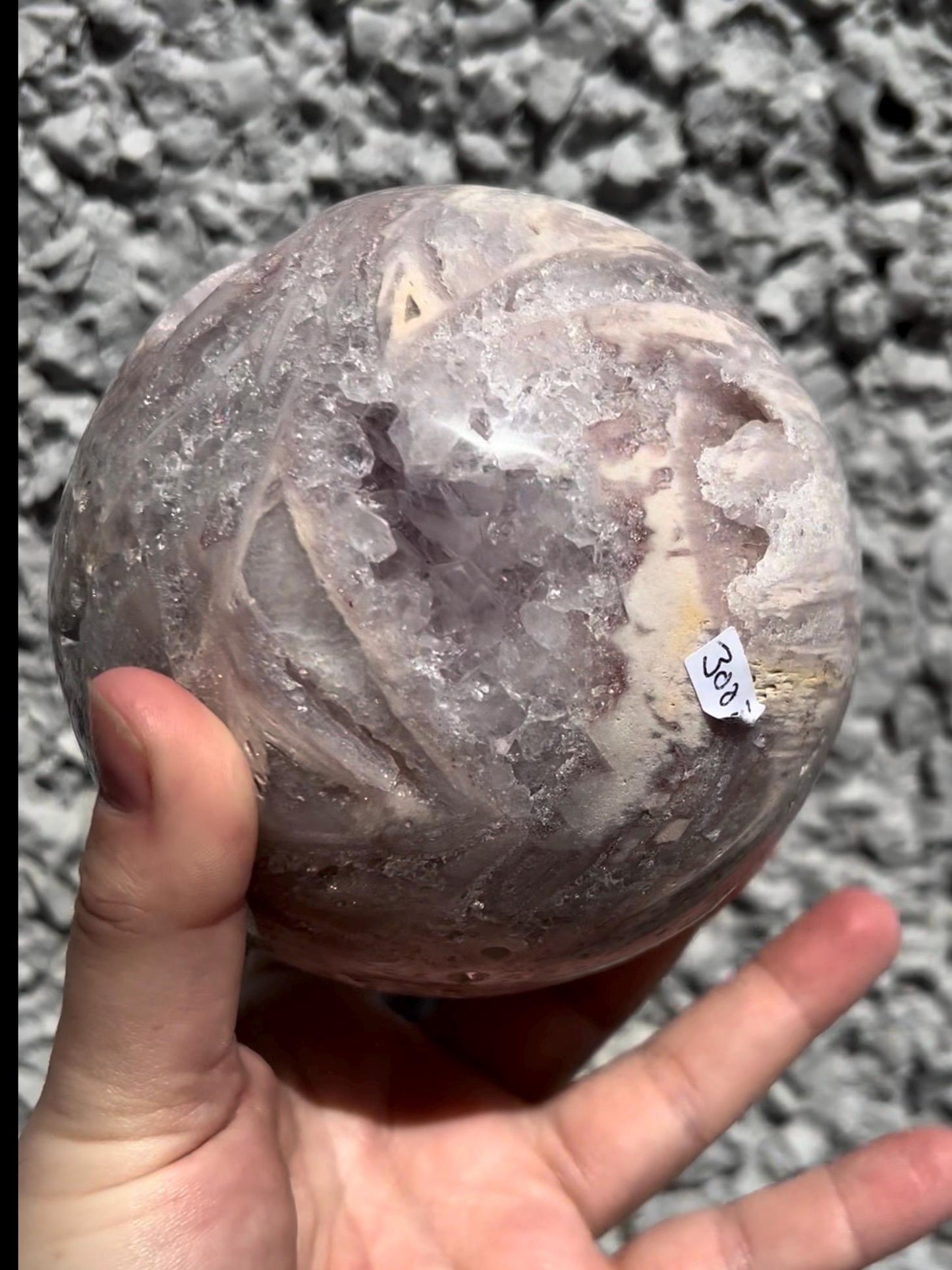 large, statement pink amethyst sphere with rutile formations in lilac tones over 1kg