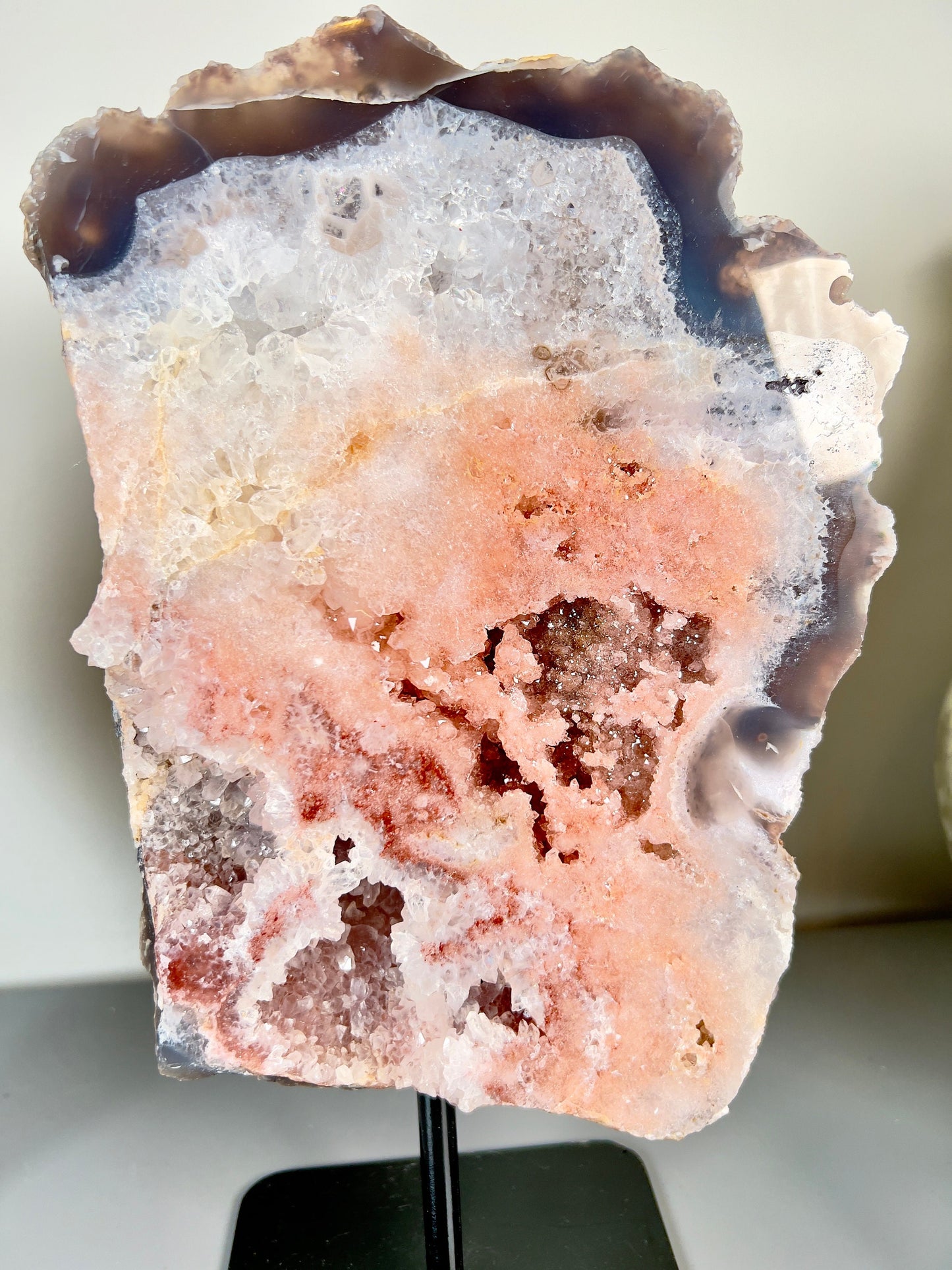 Peach, pink amethyst slab on stand  with smoky, clear and red crystallisation