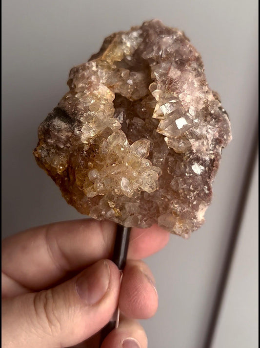 High grade, pink amethyst geode on stand quartz teeth