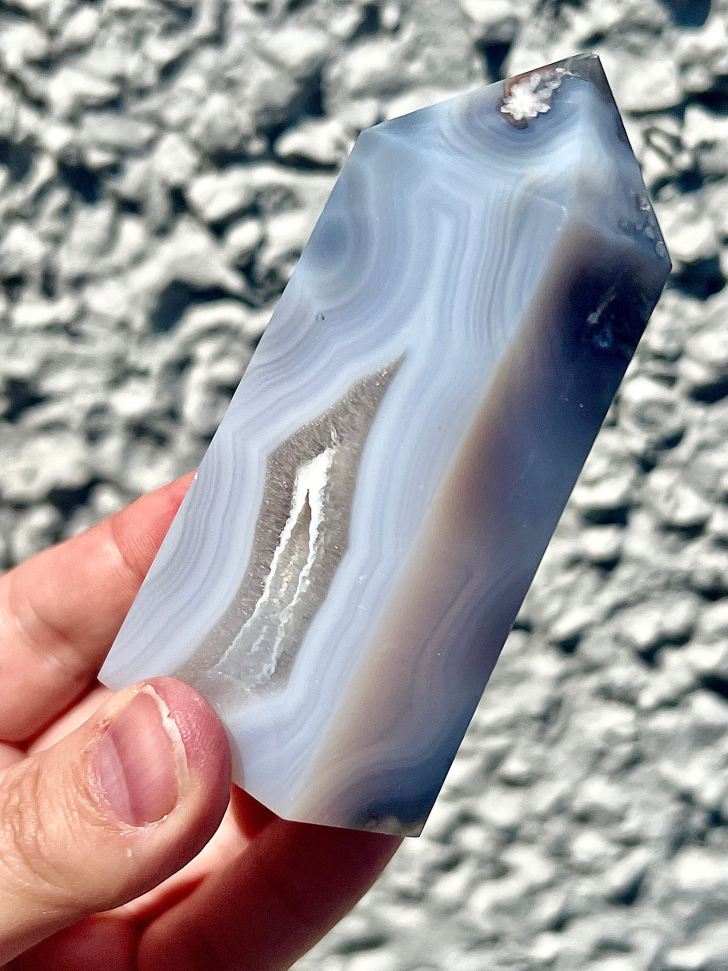 Black/grey/blue flower agate tower with banding and quartz 254g 11cm