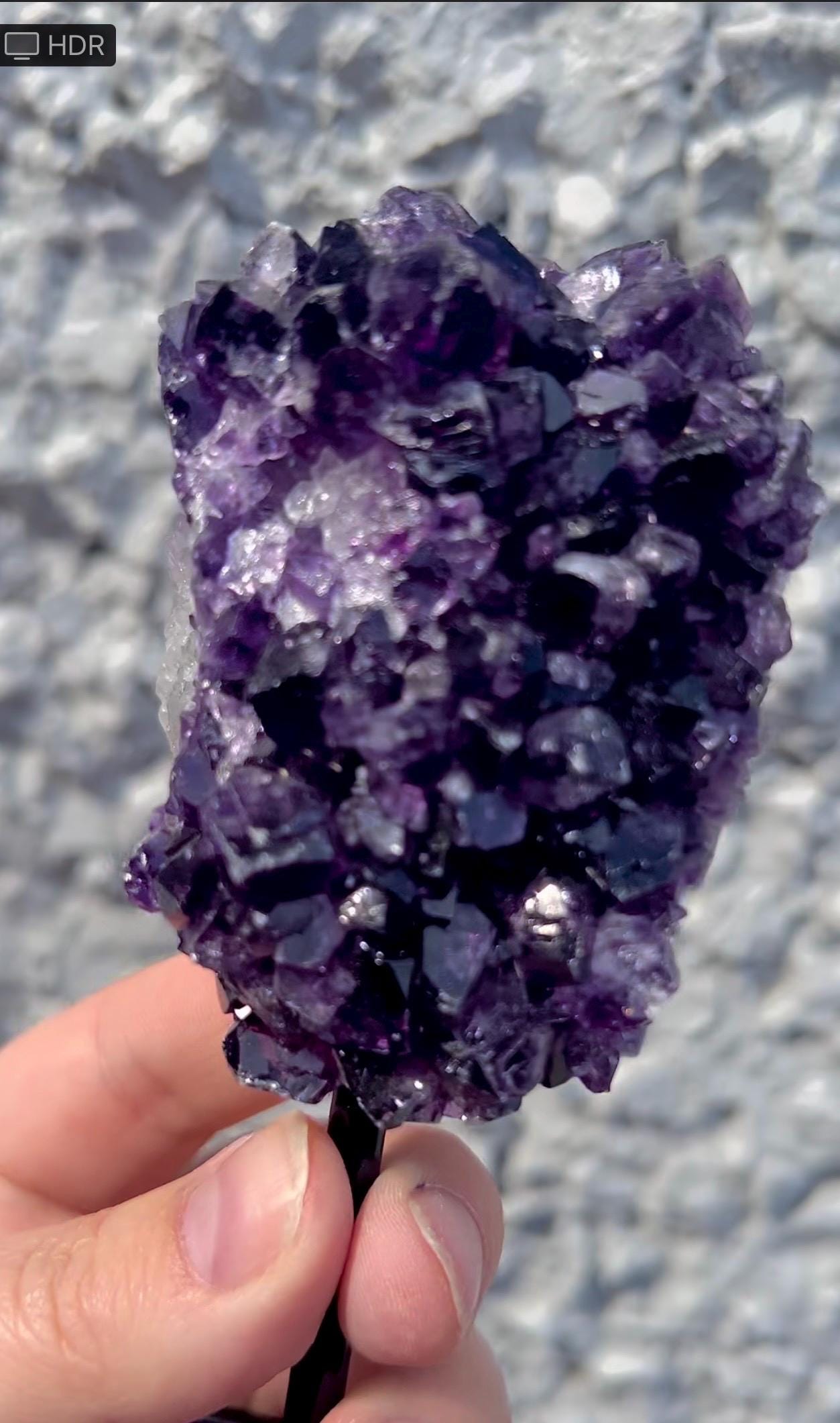 amethyst cluster on stand