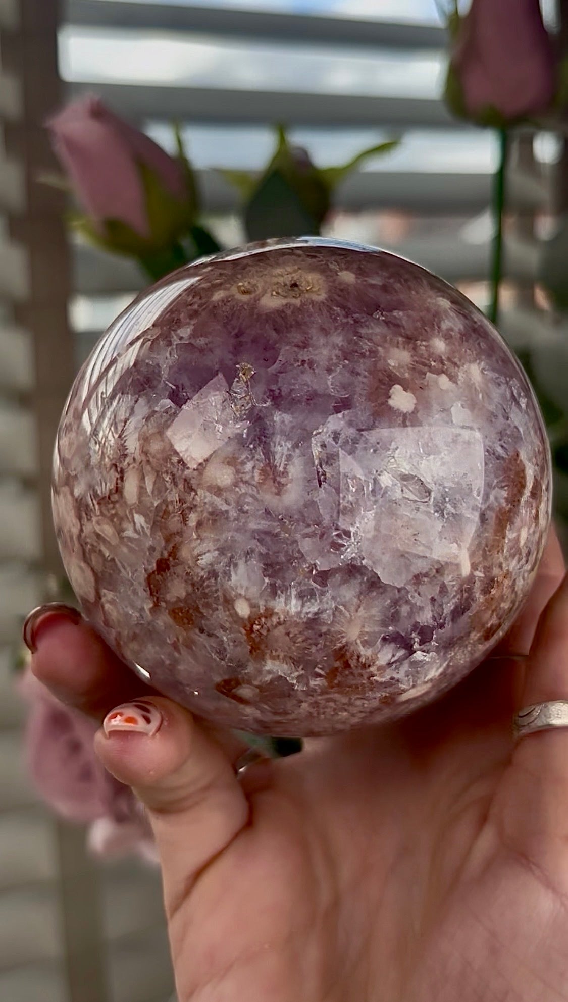High grade, amethyst Flower agate sphere with high clarity quartz