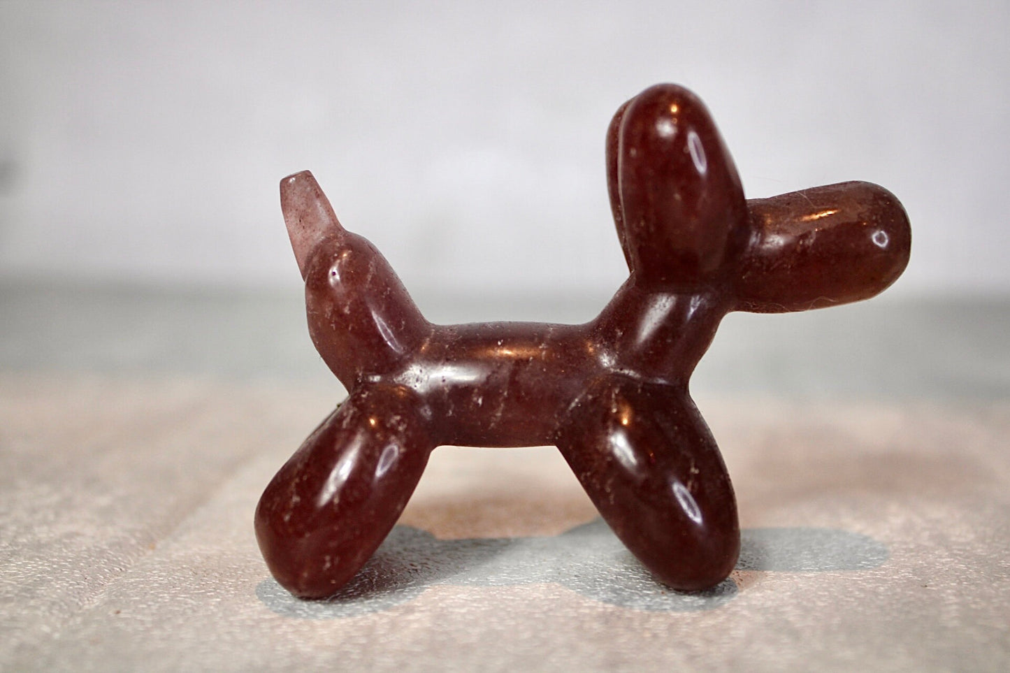 Strawberry quartz, balloon dog, carving 5.5(H) 7.5(L)