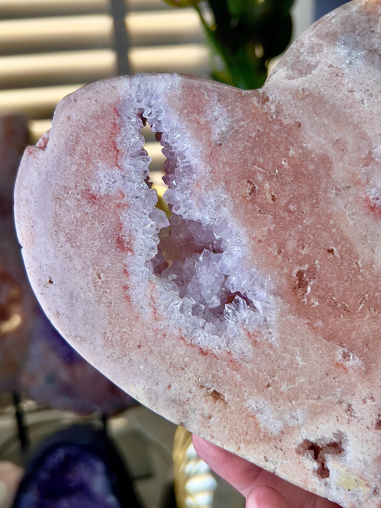 High quality, peach toned, pink amethyst heart with high drape quartz & red hematite lining on a custom gold stand 1.274kg