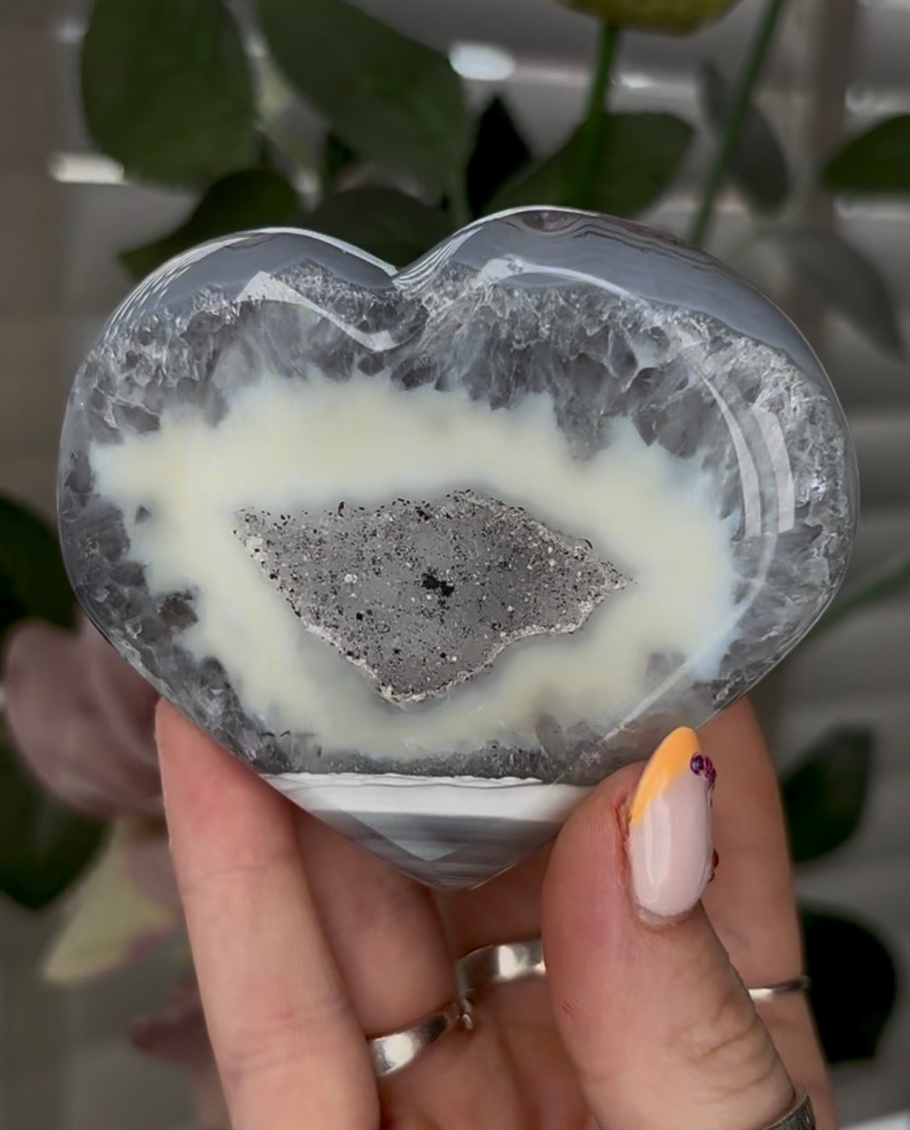 Beautiful, high grade, banded agate heart with druzy - comes with stand