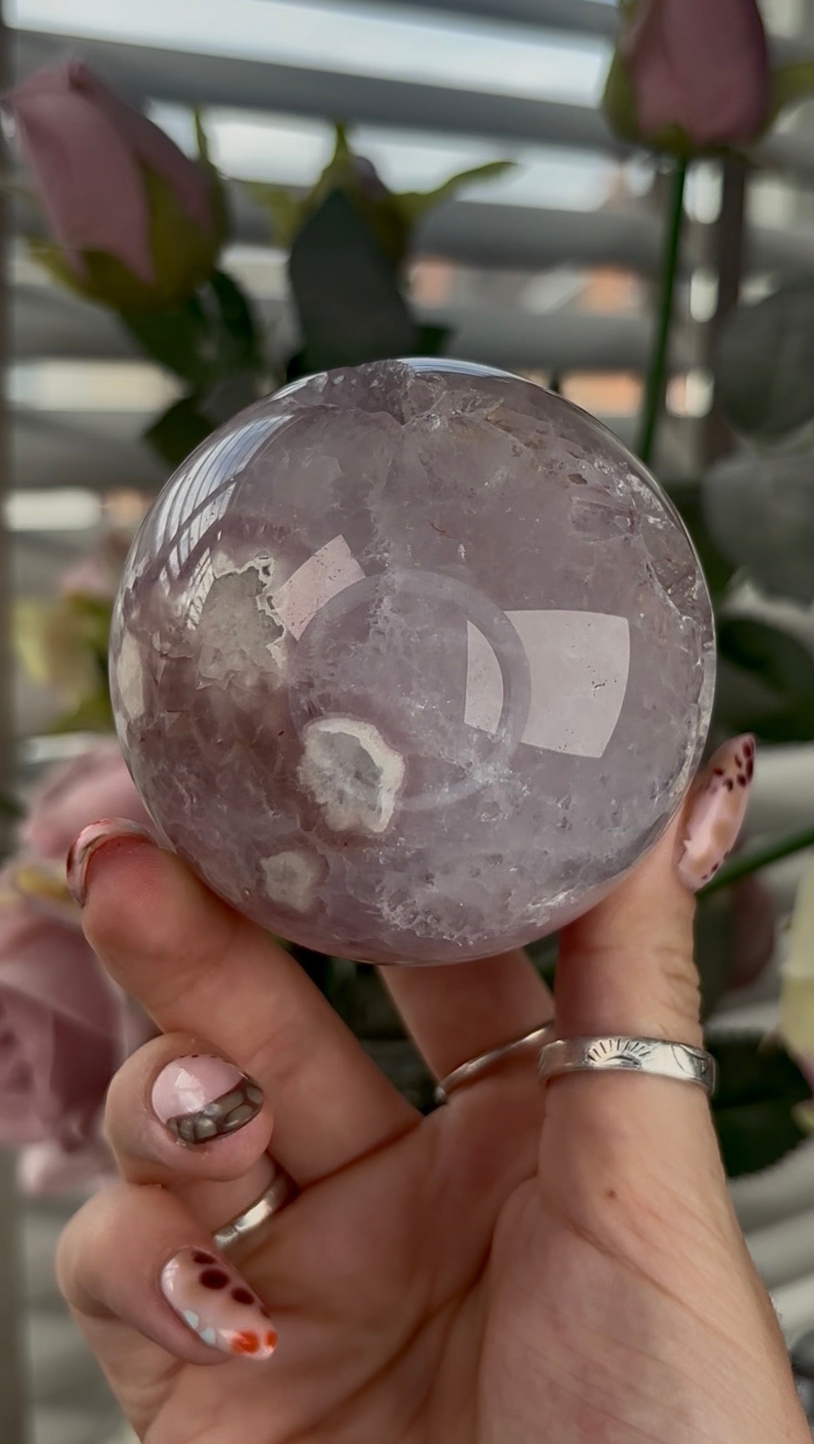 High grade, amethyst Flower agate sphere with high clarity quartz