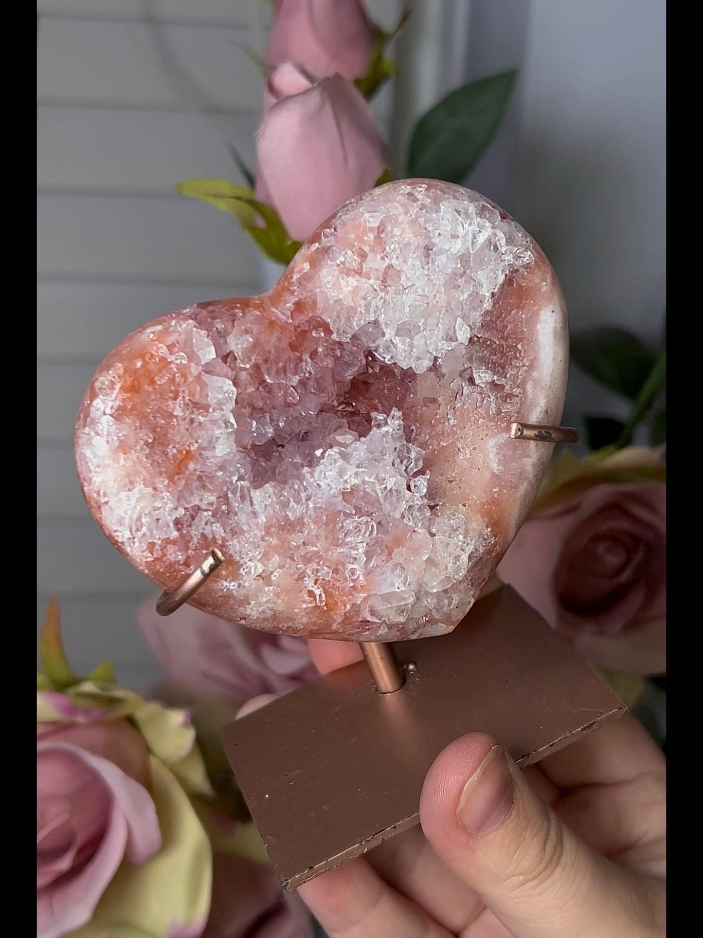 Beautiful, pink amethyst heart with vibrant red tone quartz, on stand