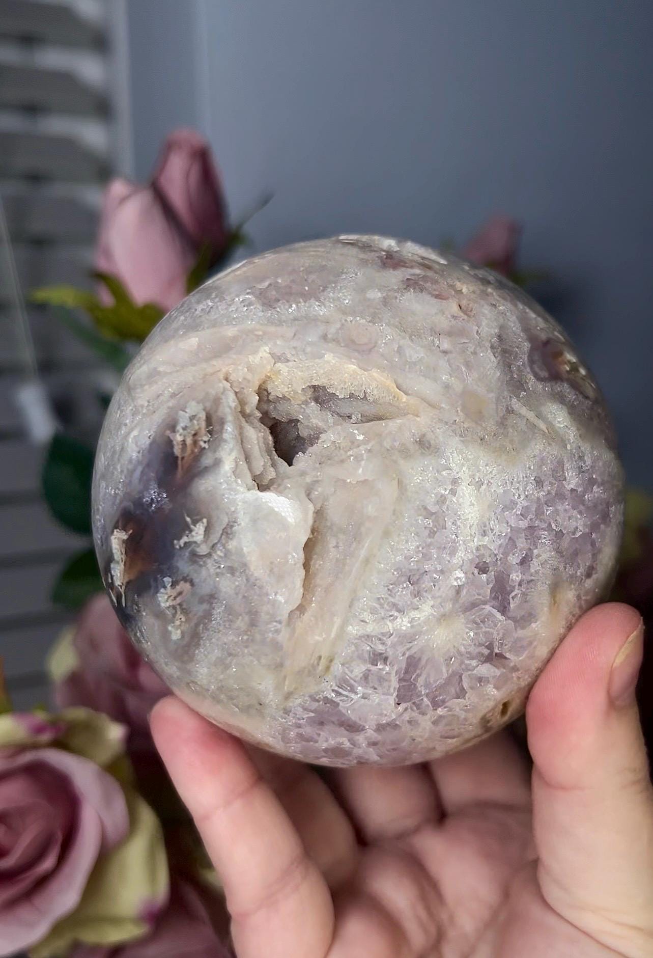 large, statement pink amethyst sphere with rutile formations and agate byover 1.220kg