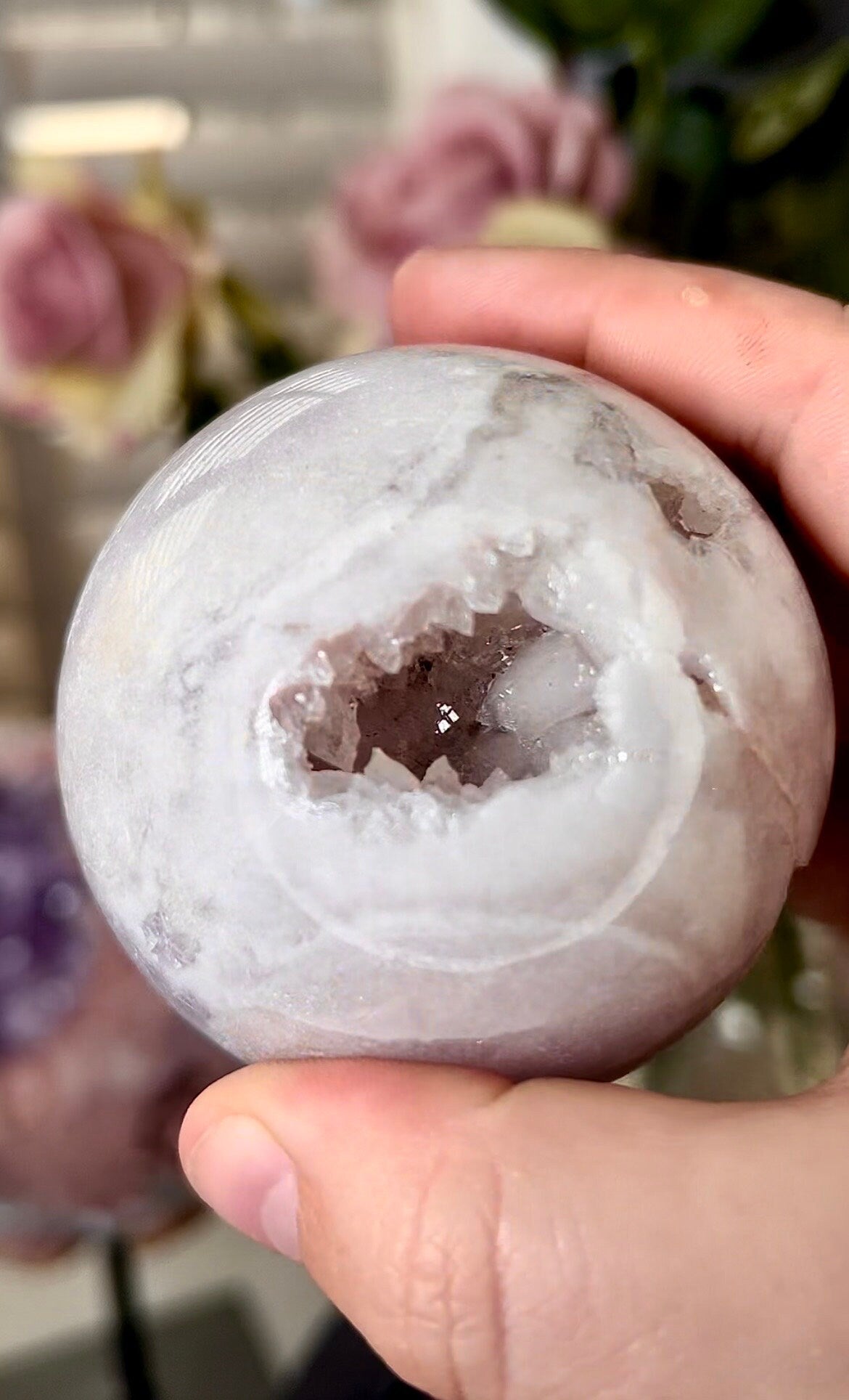 light pink amethyst sphere with chunky, druzy, teeth 380g