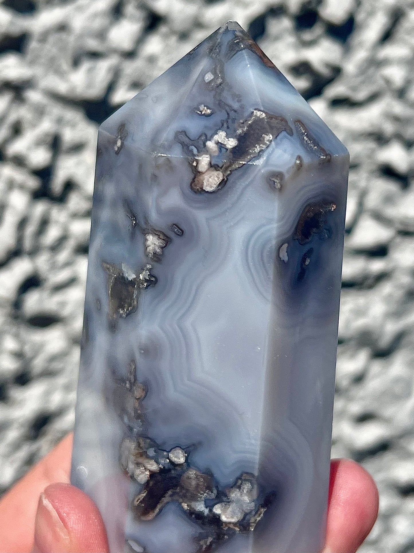 Black/grey/blue flower agate tower with banding and quartz 254g 11cm