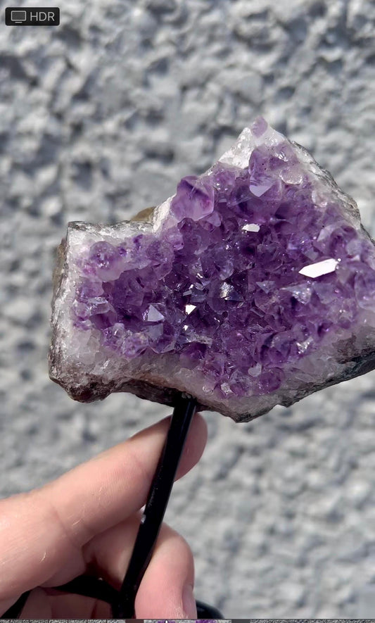 amethyst cluster on stand
