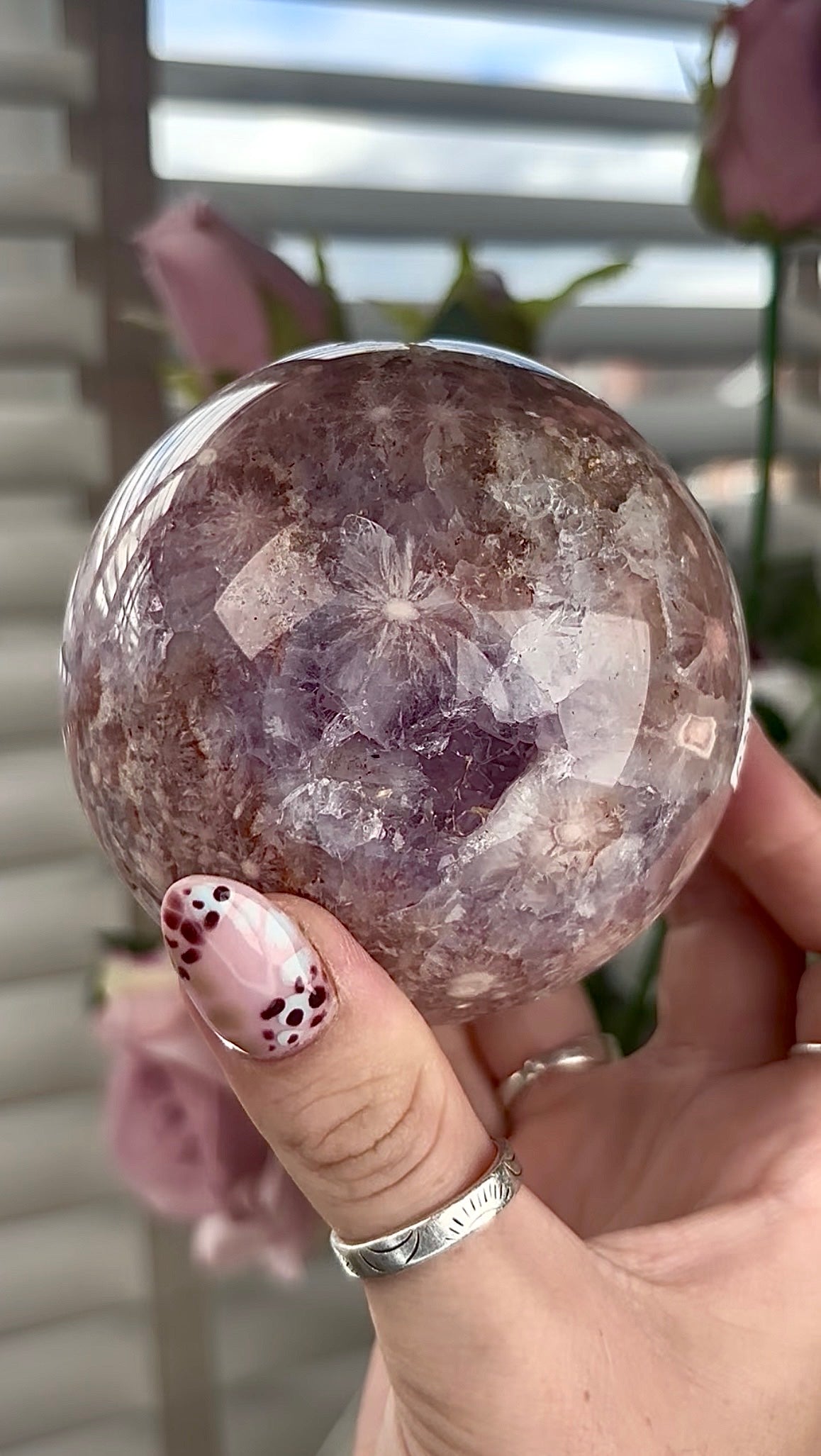 High grade, amethyst Flower agate sphere with high clarity quartz