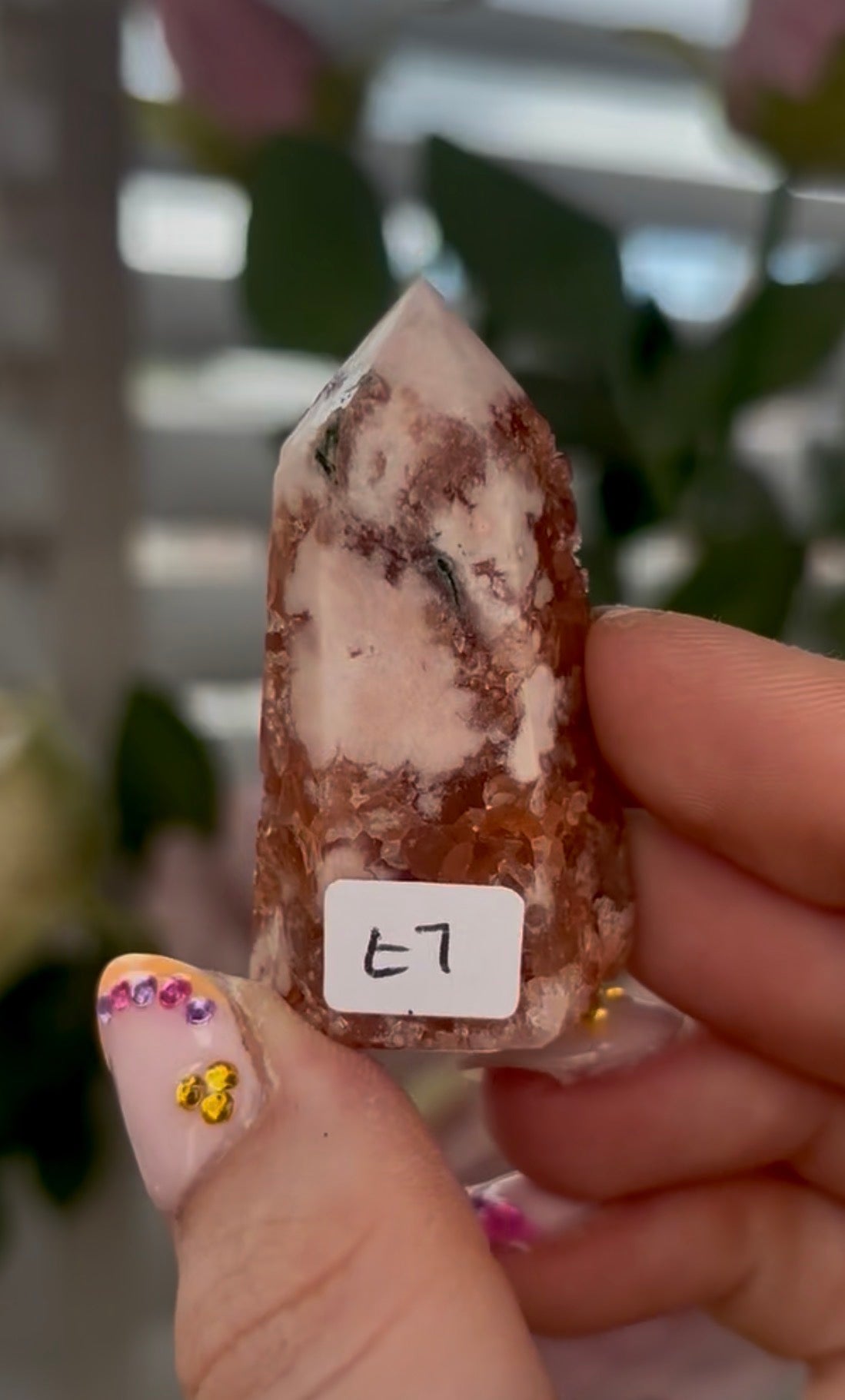 Mini Pink amethyst tower, in a burnt orange