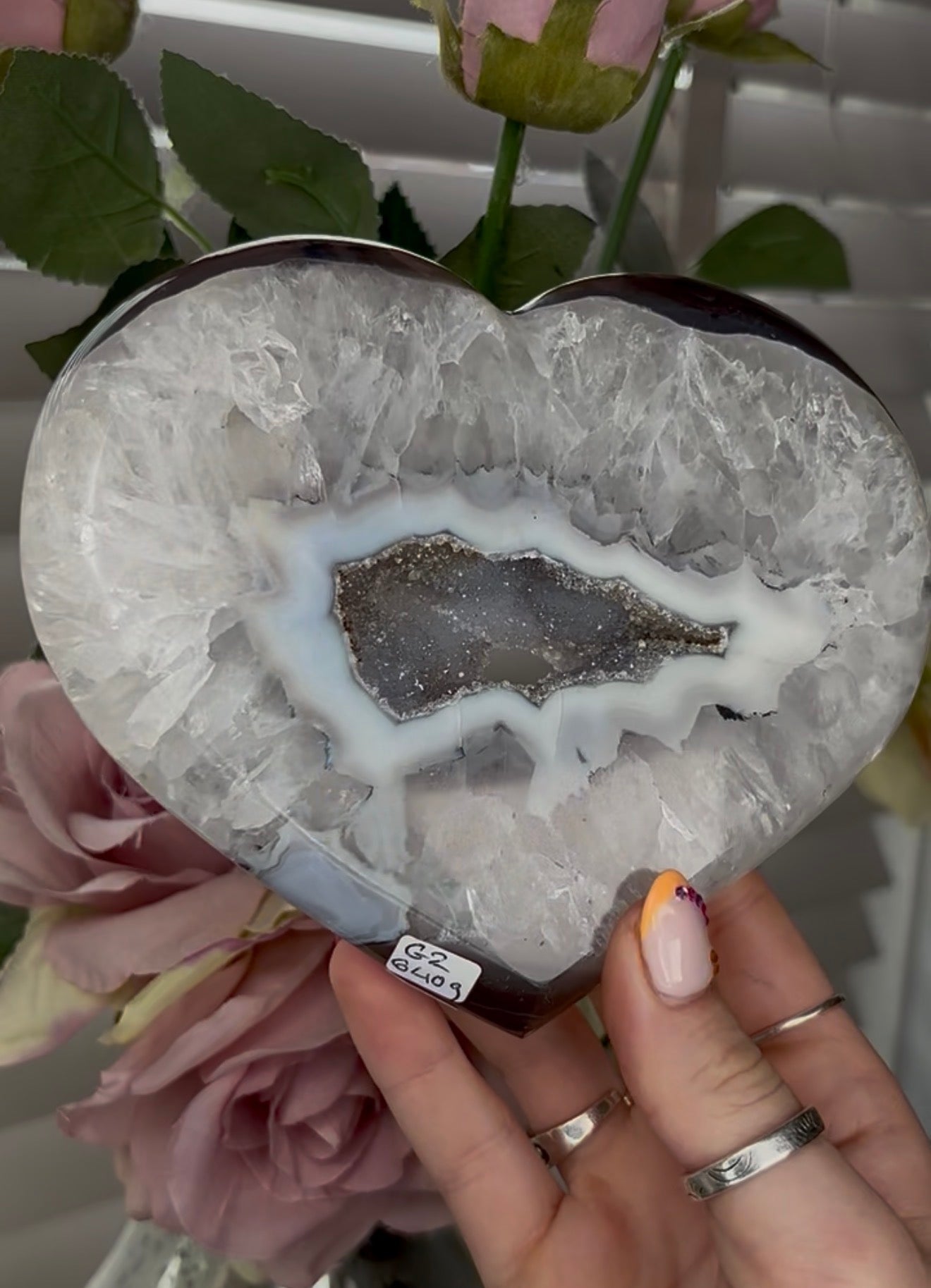 Beautiful, high grade, agate heart with druzy - comes with stand
