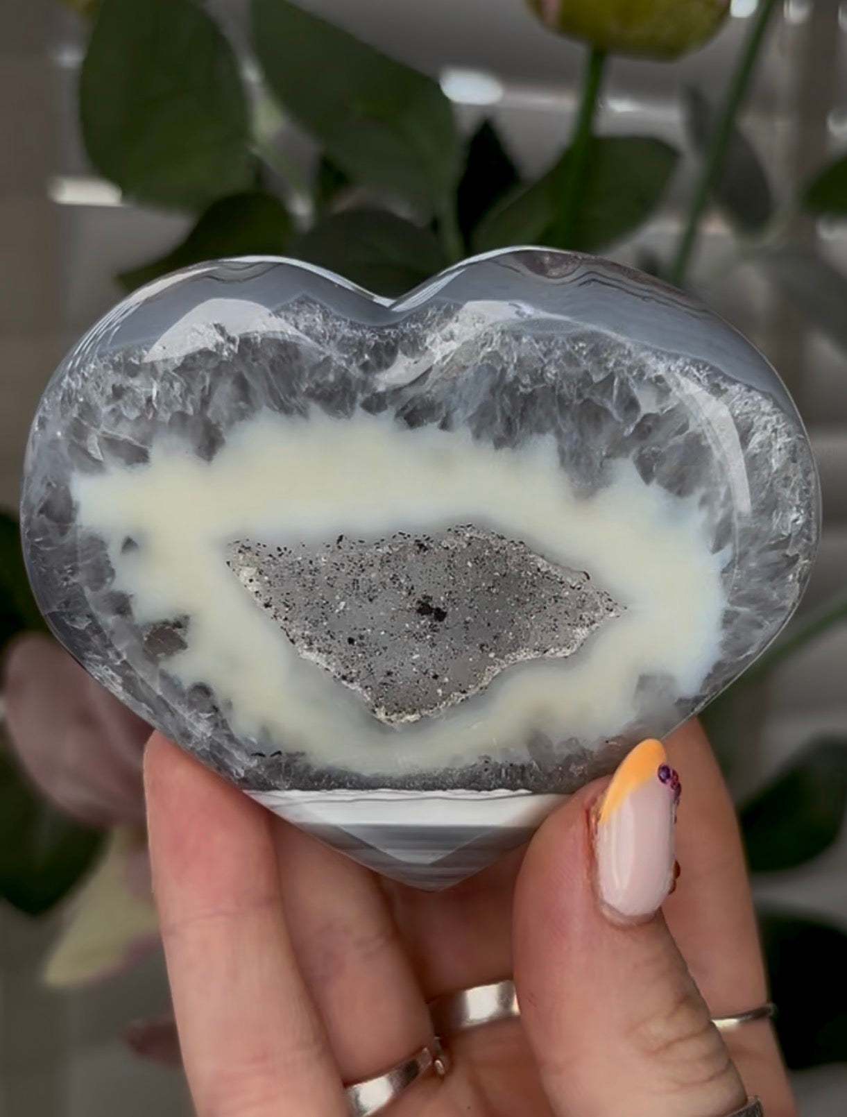 Beautiful, high grade, banded agate heart with druzy - comes with stand