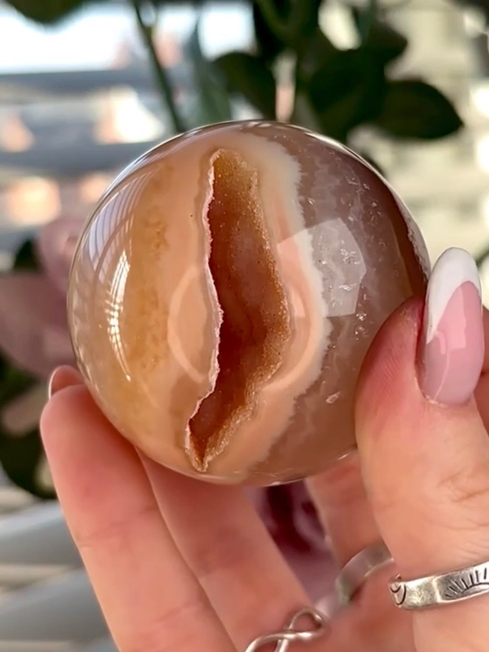 Gorgeous, high grade, agate sphere in orange/peach tones