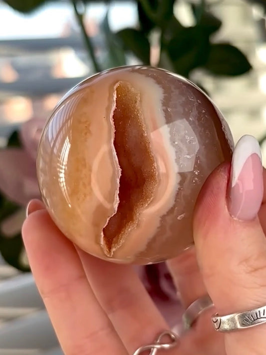 Gorgeous, high grade, agate sphere in orange/peach tones