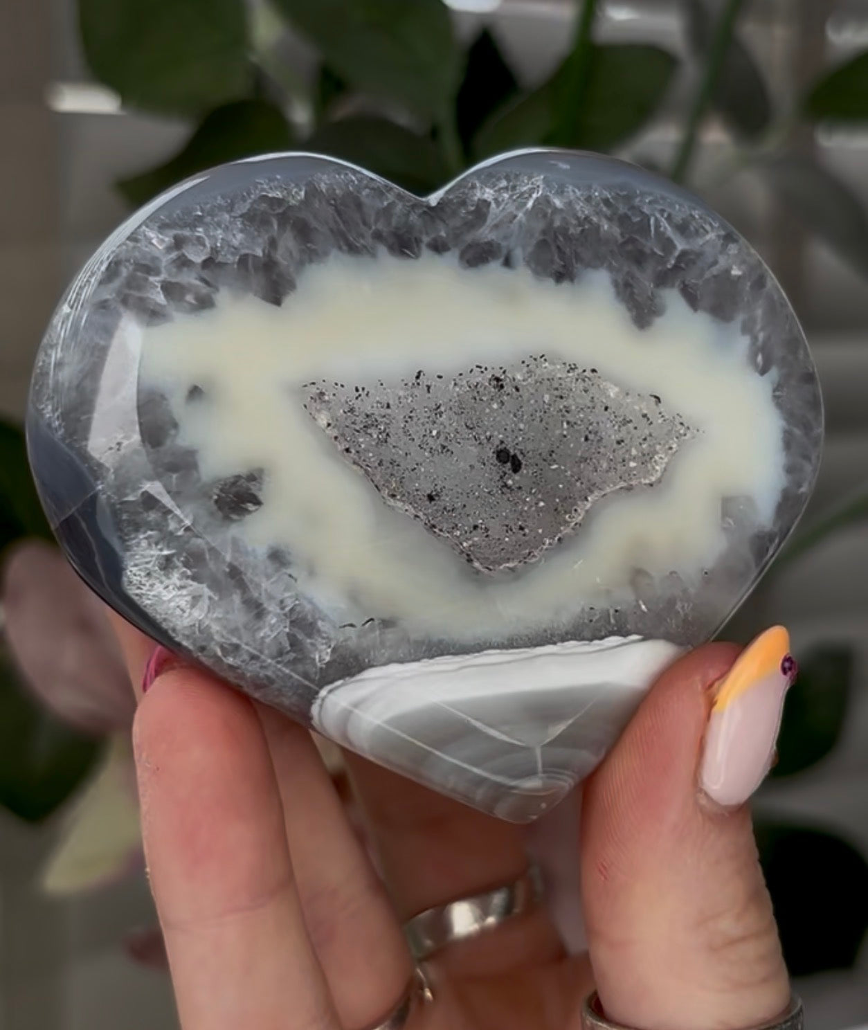 Beautiful, high grade, banded agate heart with druzy - comes with stand
