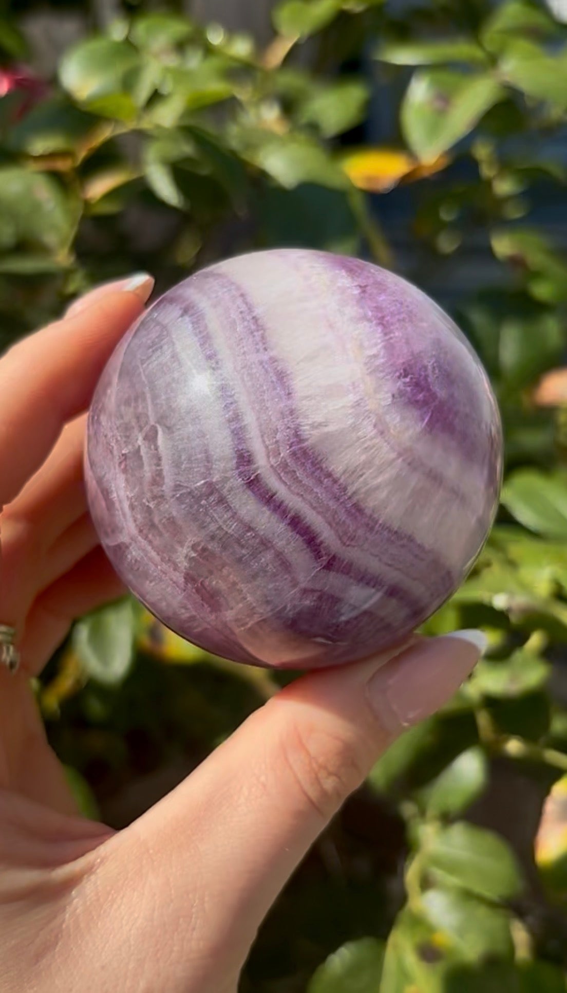 High grade, candy striped rainbow fluorite sphere - 6.3cm