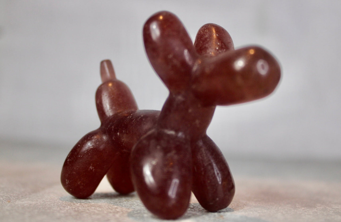 Strawberry quartz, balloon dog, carving 5.5(H) 7.5(L)