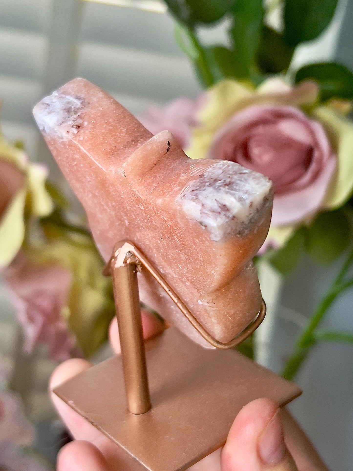 Pink amethyst butterfly in a peach tone with quartz middle and rutile edging, comes with stand