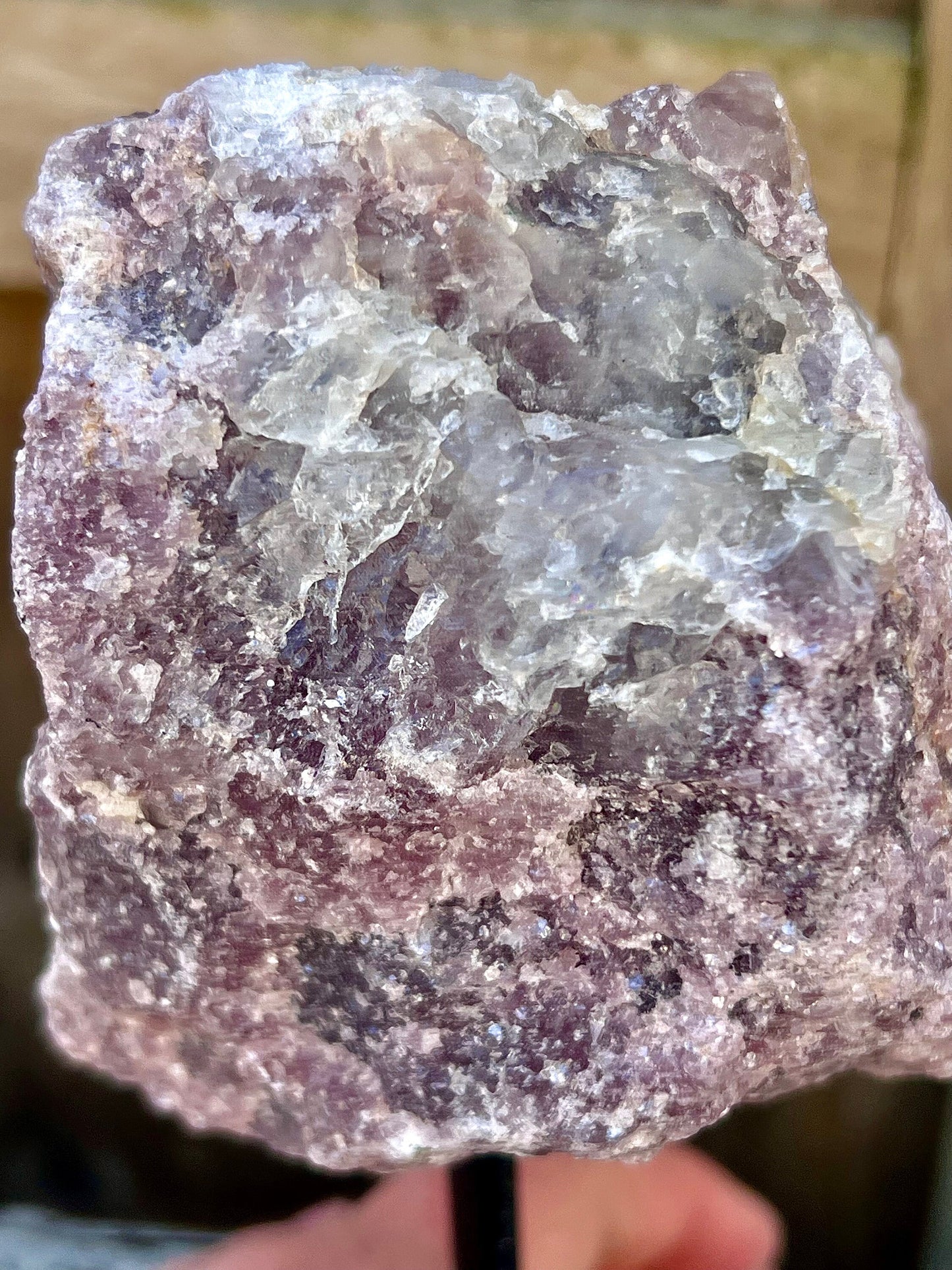 Rough lepidolite on stand