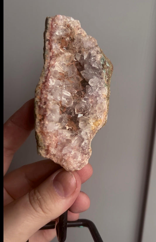 High grade, pink amethyst geode on stand quartz teeth