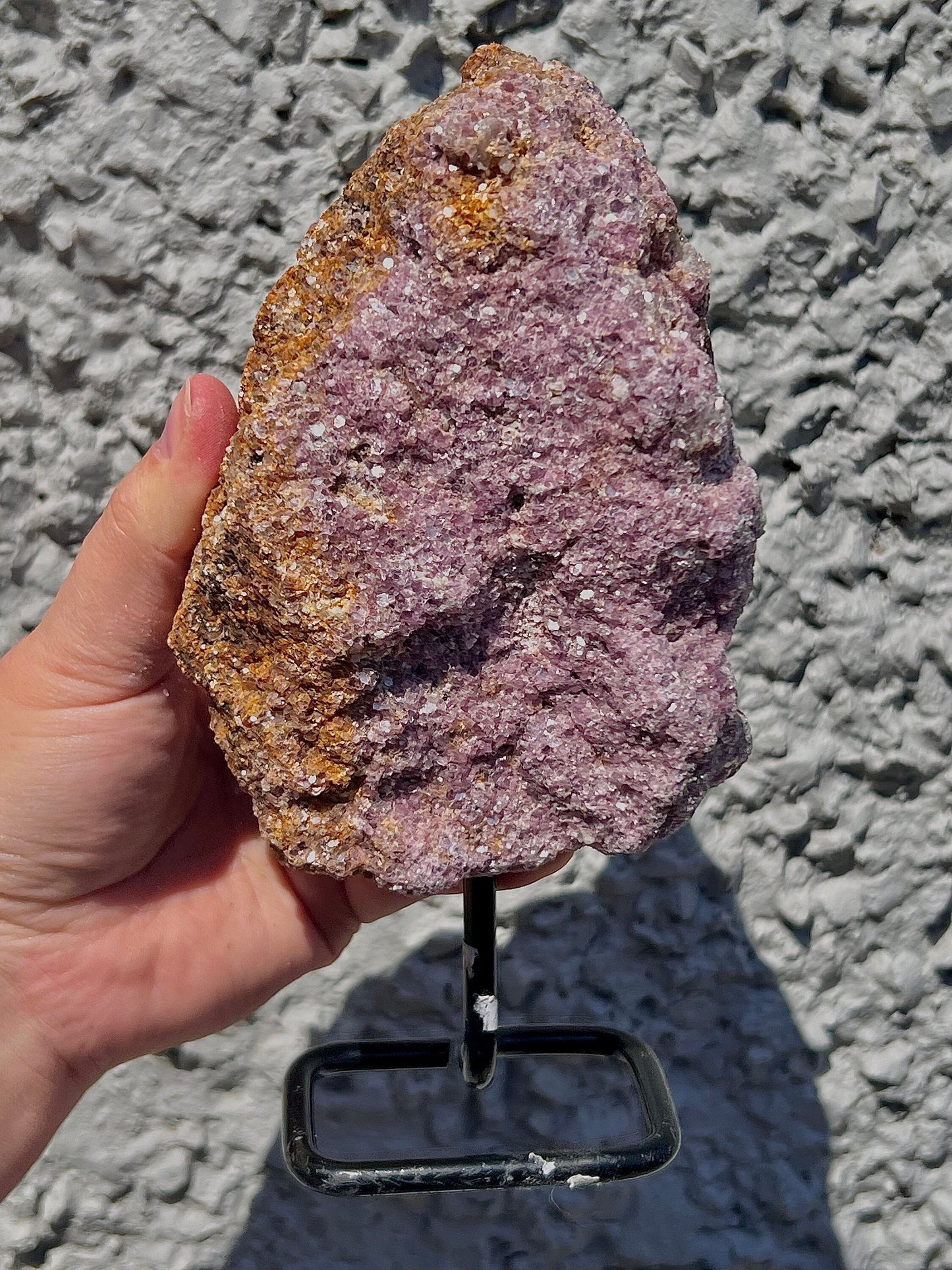 Rough lepidolite on stand
