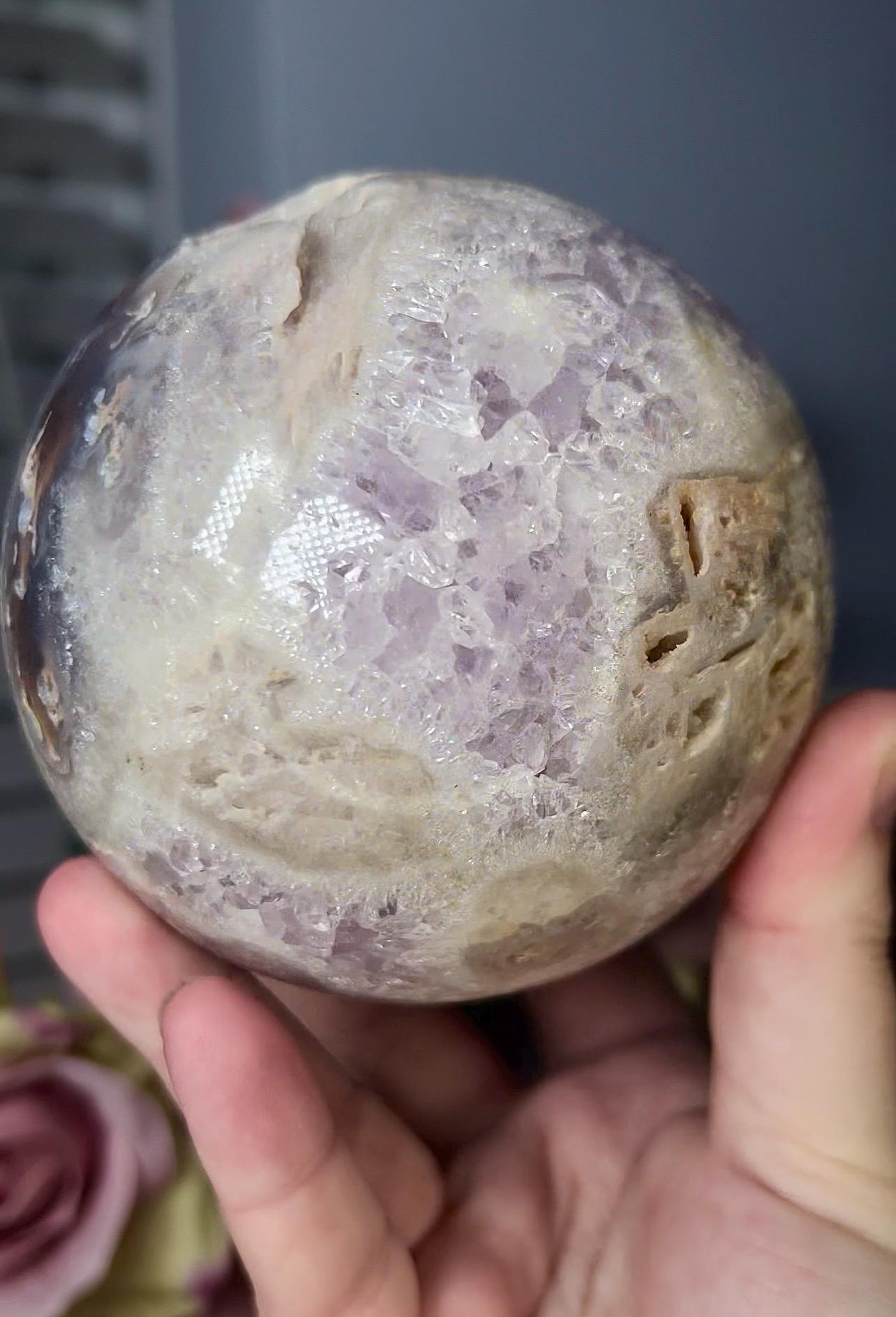 large, statement pink amethyst sphere with rutile formations and agate byover 1.220kg