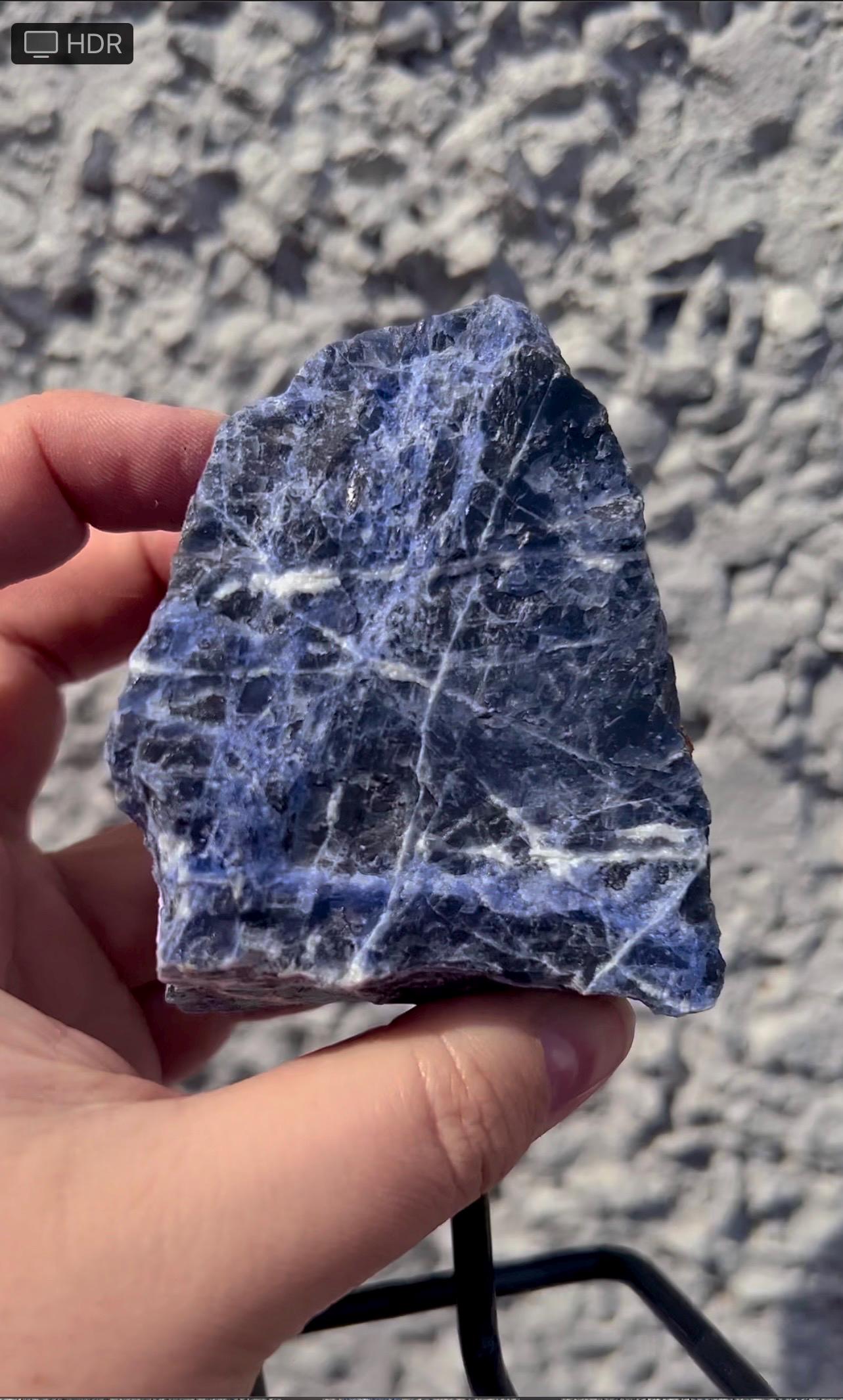 Rough Blue sodalite on stand