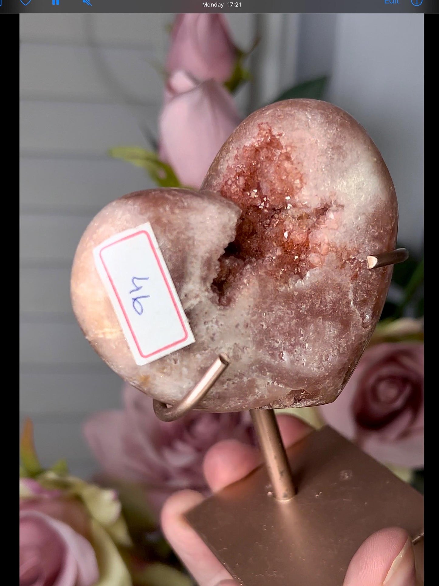 Beautiful, pink amethyst heart in a red tone with stand