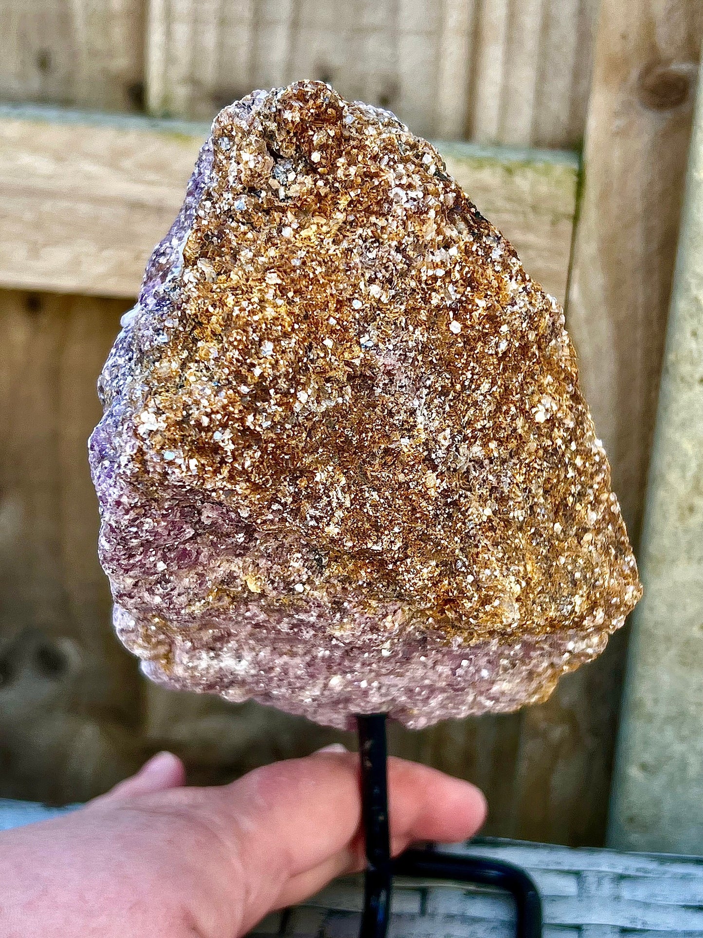 Rough lepidolite on stand