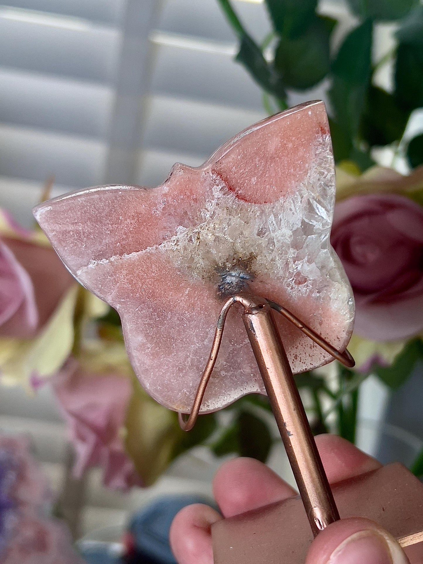 Pink amethyst butterfly in a peach tone with flower on stand